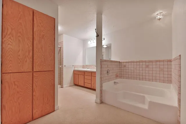 a view of cabinets with wooden floor