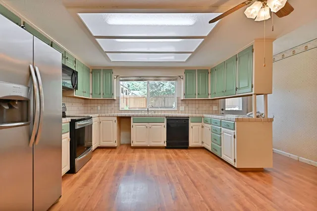 a bathroom with a sink a bathtub and a shower