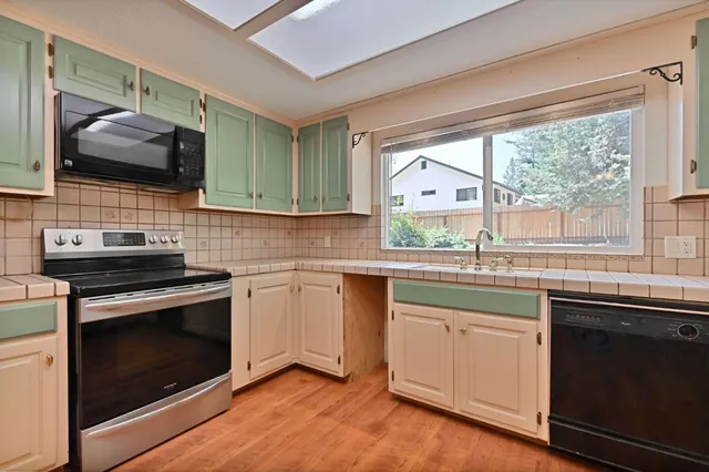 a view of a hallway with a window