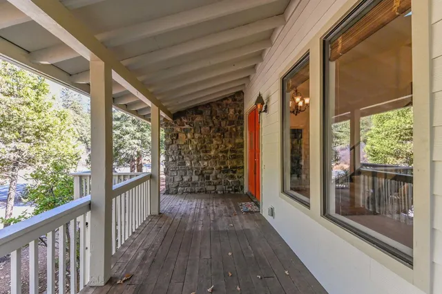 a view of entryway and hall with a front door