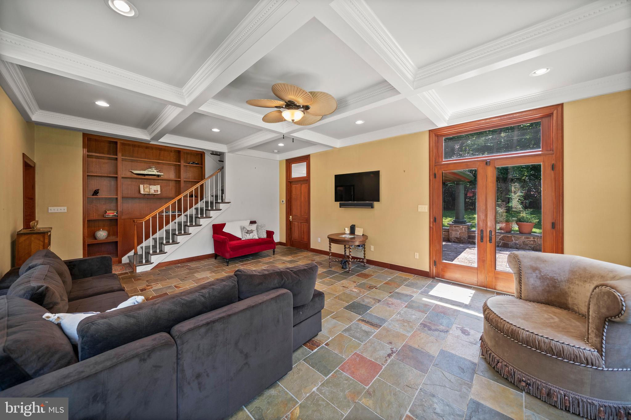 228 Berkley Road Devon, PA 19333 - Photo 14 of 44 GREAT ROOM WITH BUILT -INS AND BACK STAIRCASE