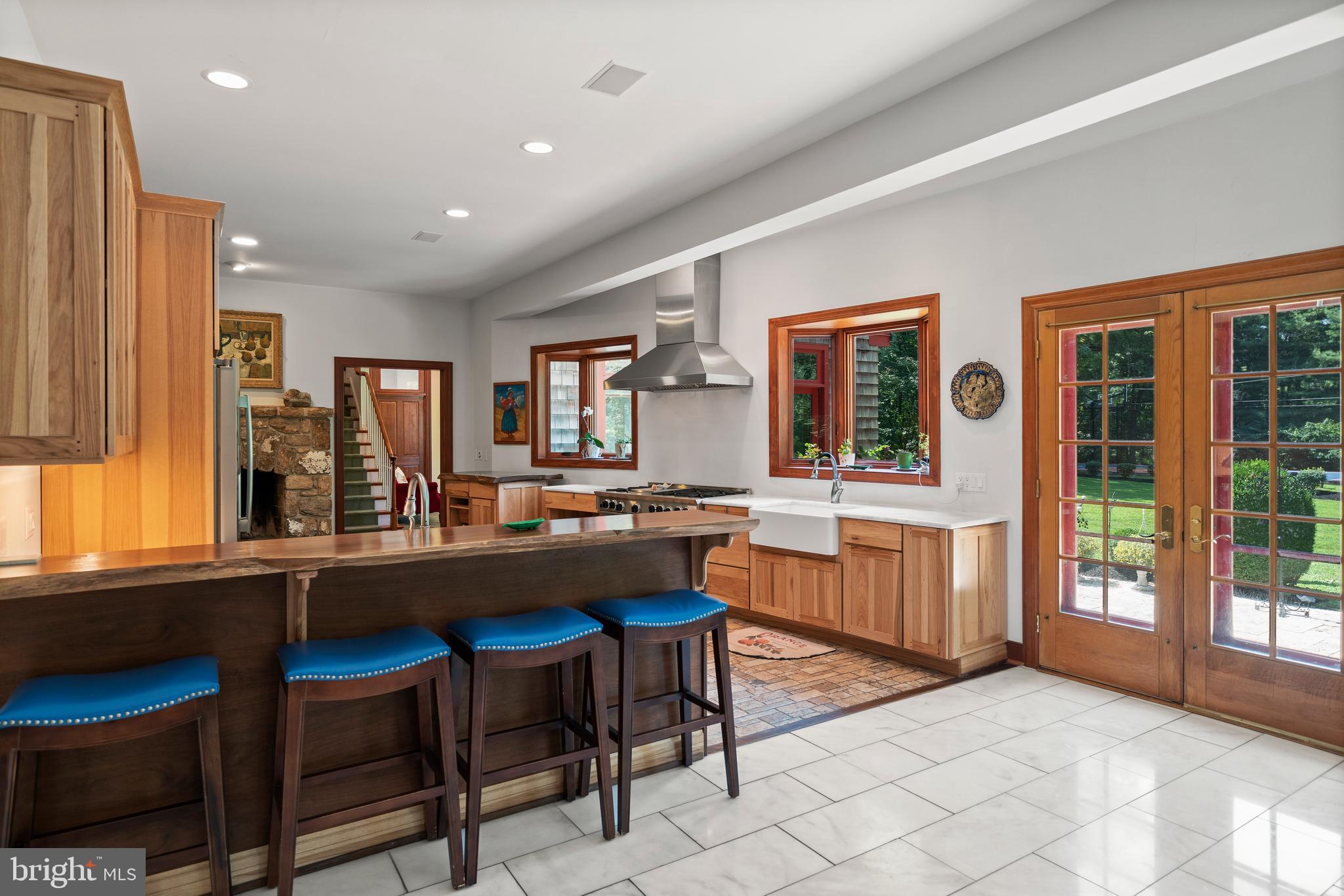 228 Berkley Road Devon, PA 19333 - Photo 7 of 44 FRENCH DOORS TO TERRACE AND OUTDOOR LIVING SPACES