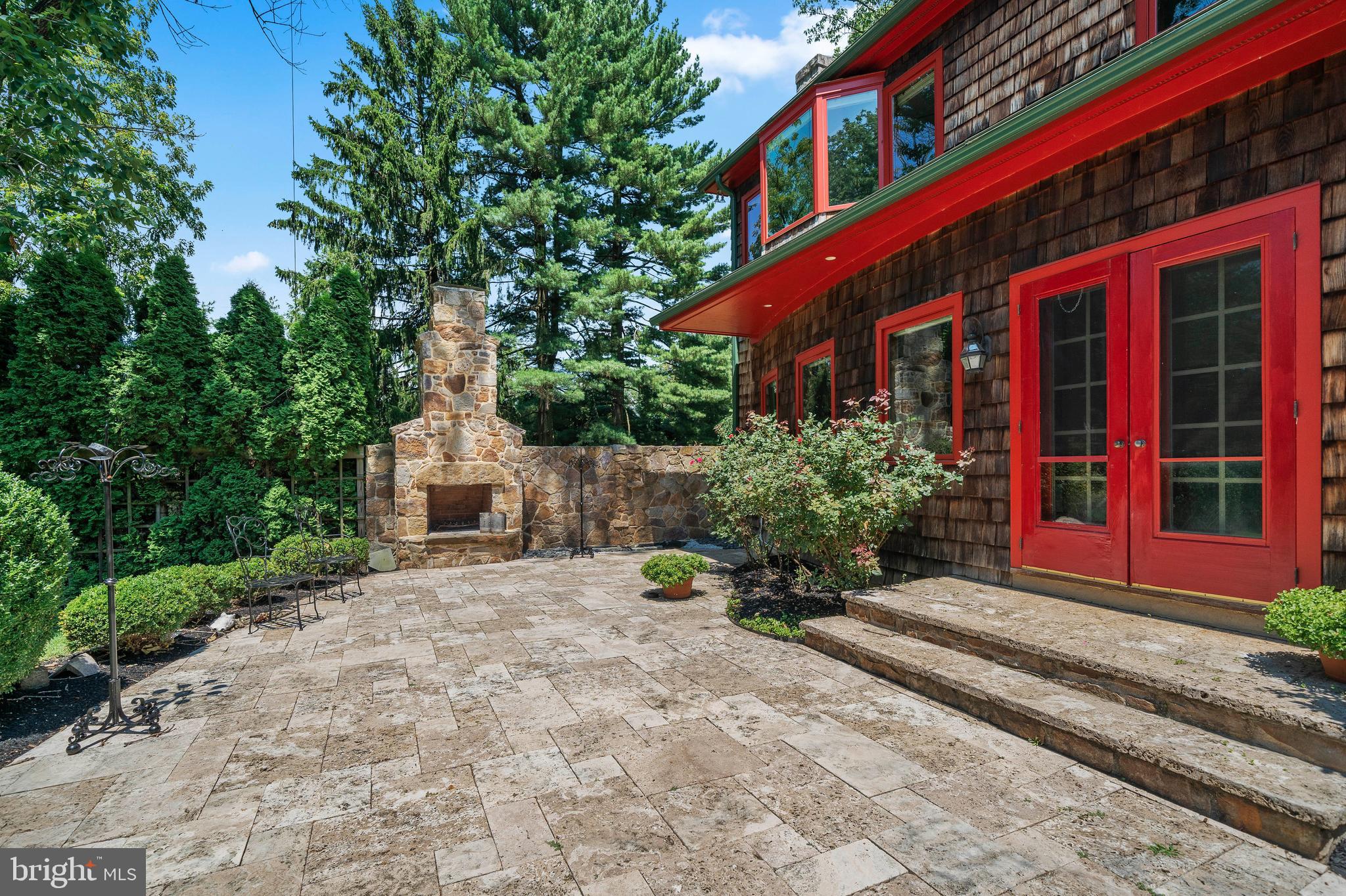 228 Berkley Road Devon, PA 19333 - Photo 9 of 44 OUTDOOR FIREPLACE AND WATER FEATURE WALL