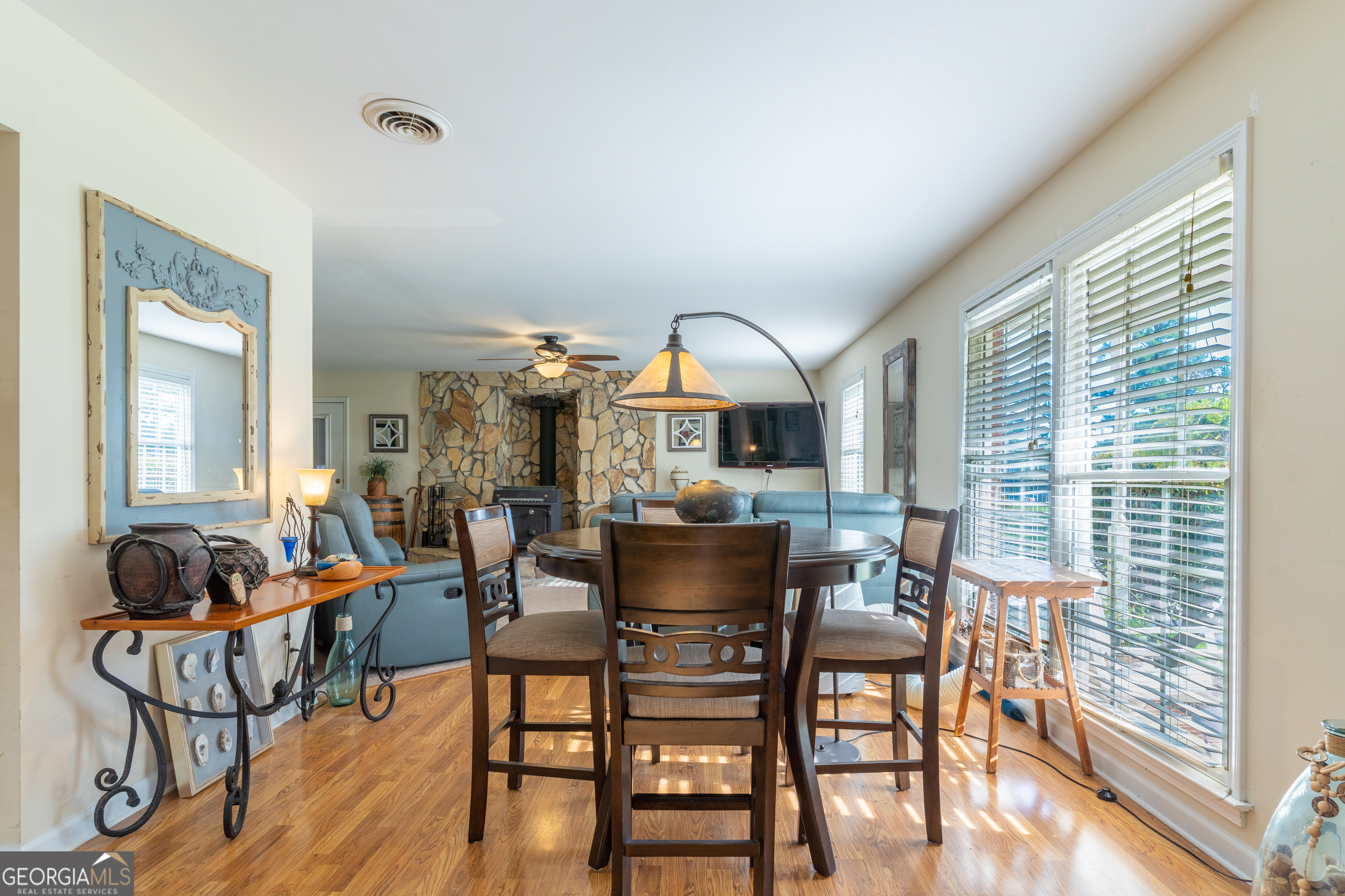 1537 Jackson Street Locust Grove, GA 30248 - Photo 11 of 41 a dining room with furniture and wooden floor