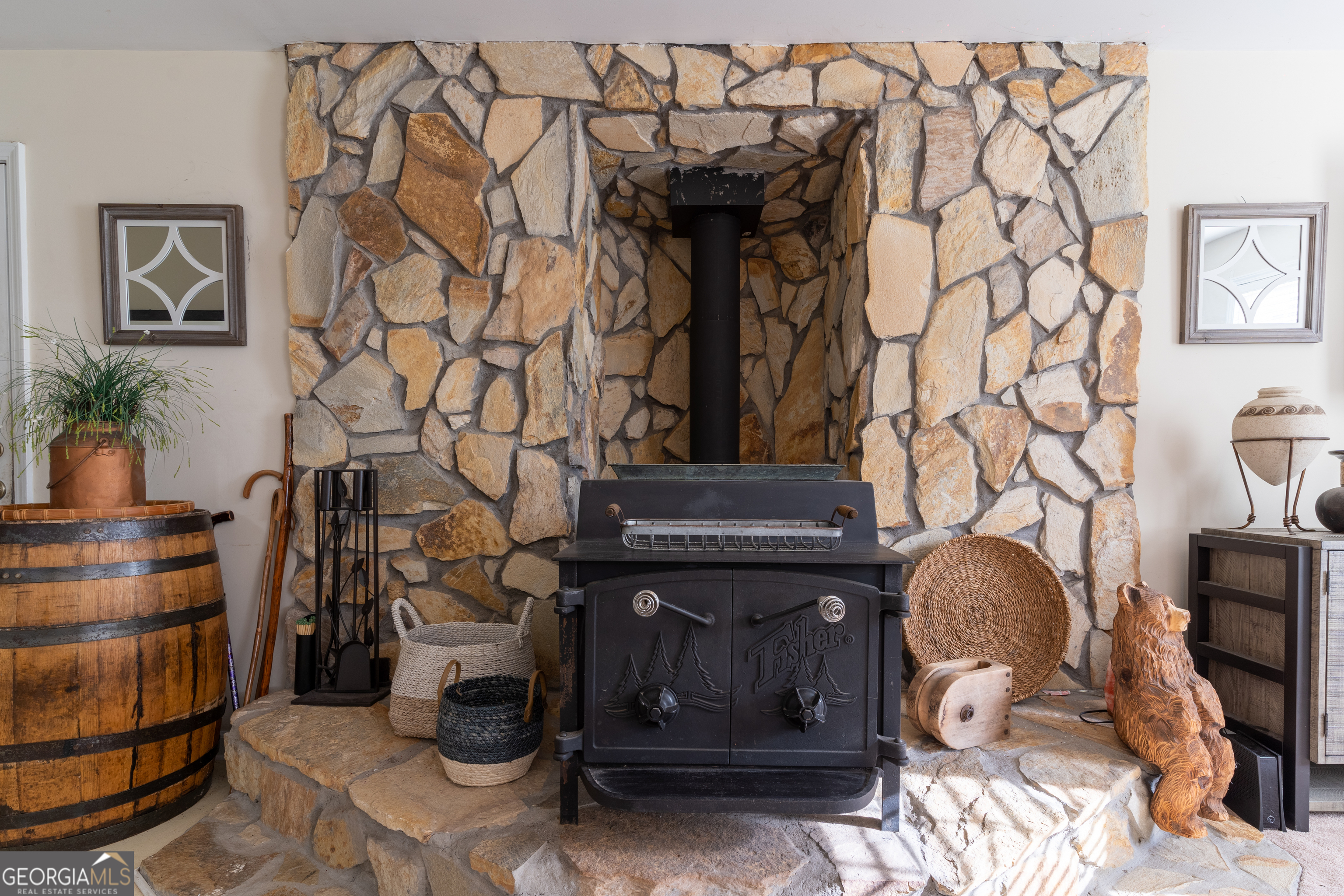 1537 Jackson Street Locust Grove, GA 30248 - Photo 15 of 41 a room with fireplace and cabinets