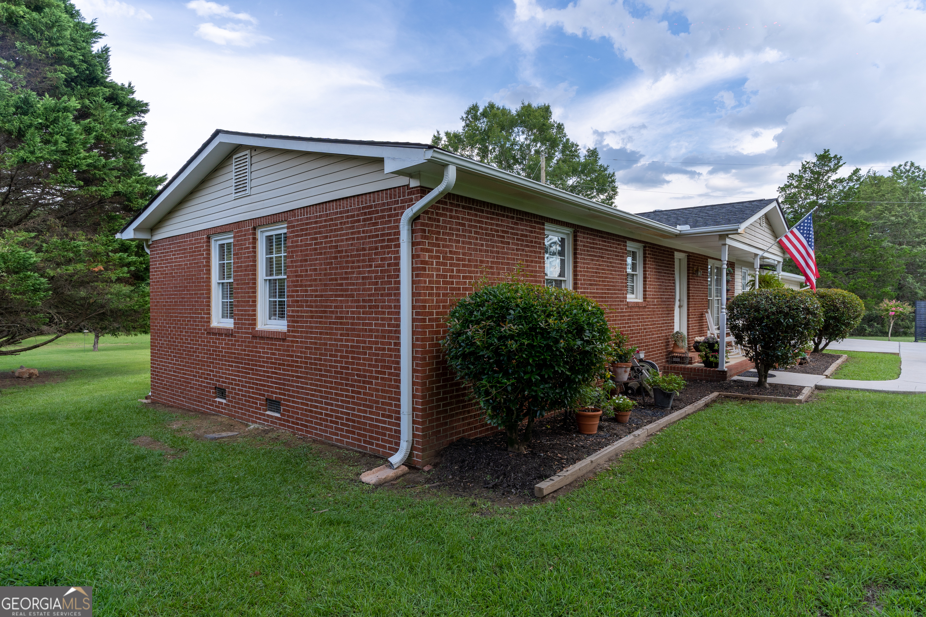 1537 Jackson Street Locust Grove, GA 30248 - Photo 32 of 41 a backyard of a house with lots of green space