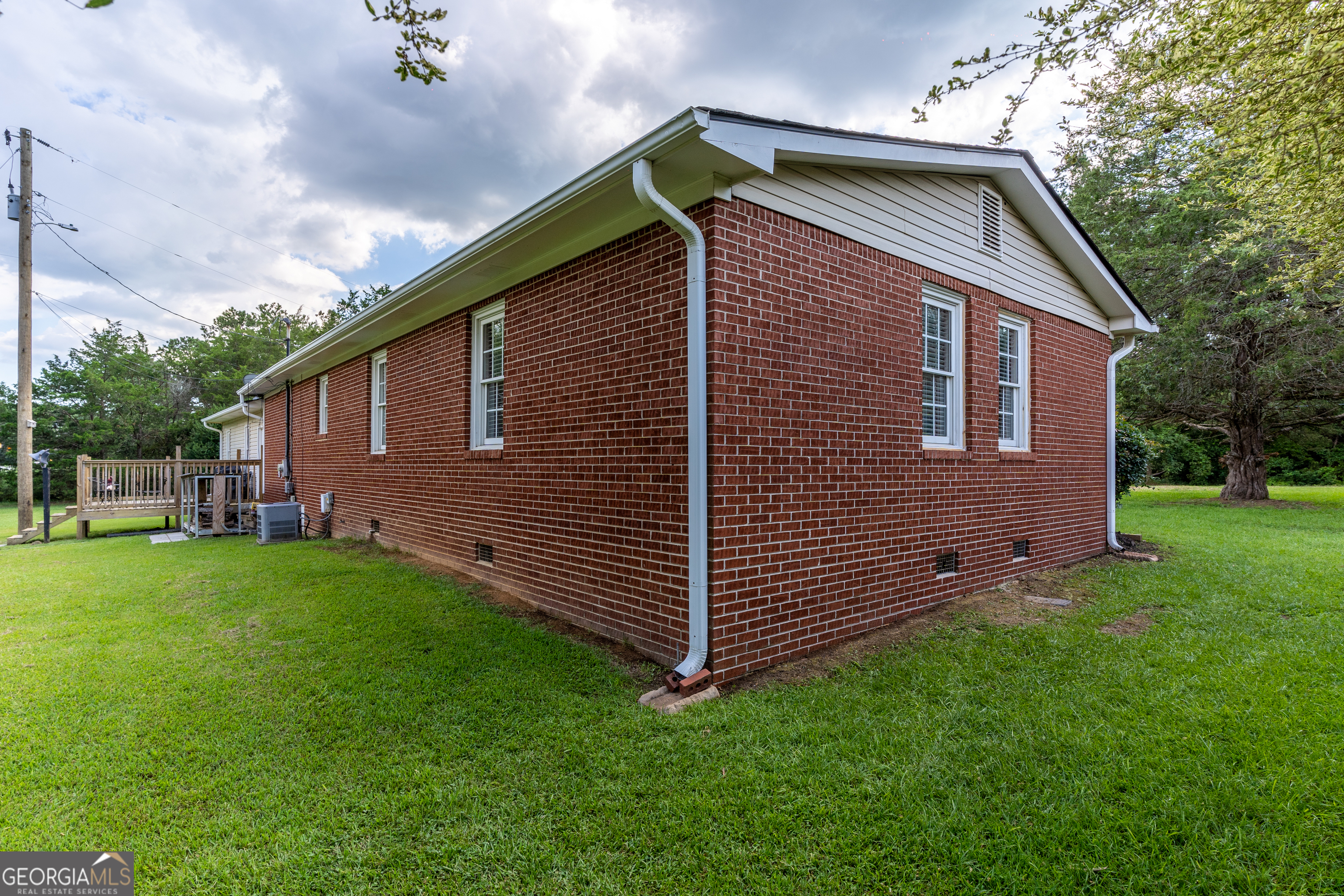 1537 Jackson Street Locust Grove, GA 30248 - Photo 33 of 41 a front view of a house with a yard