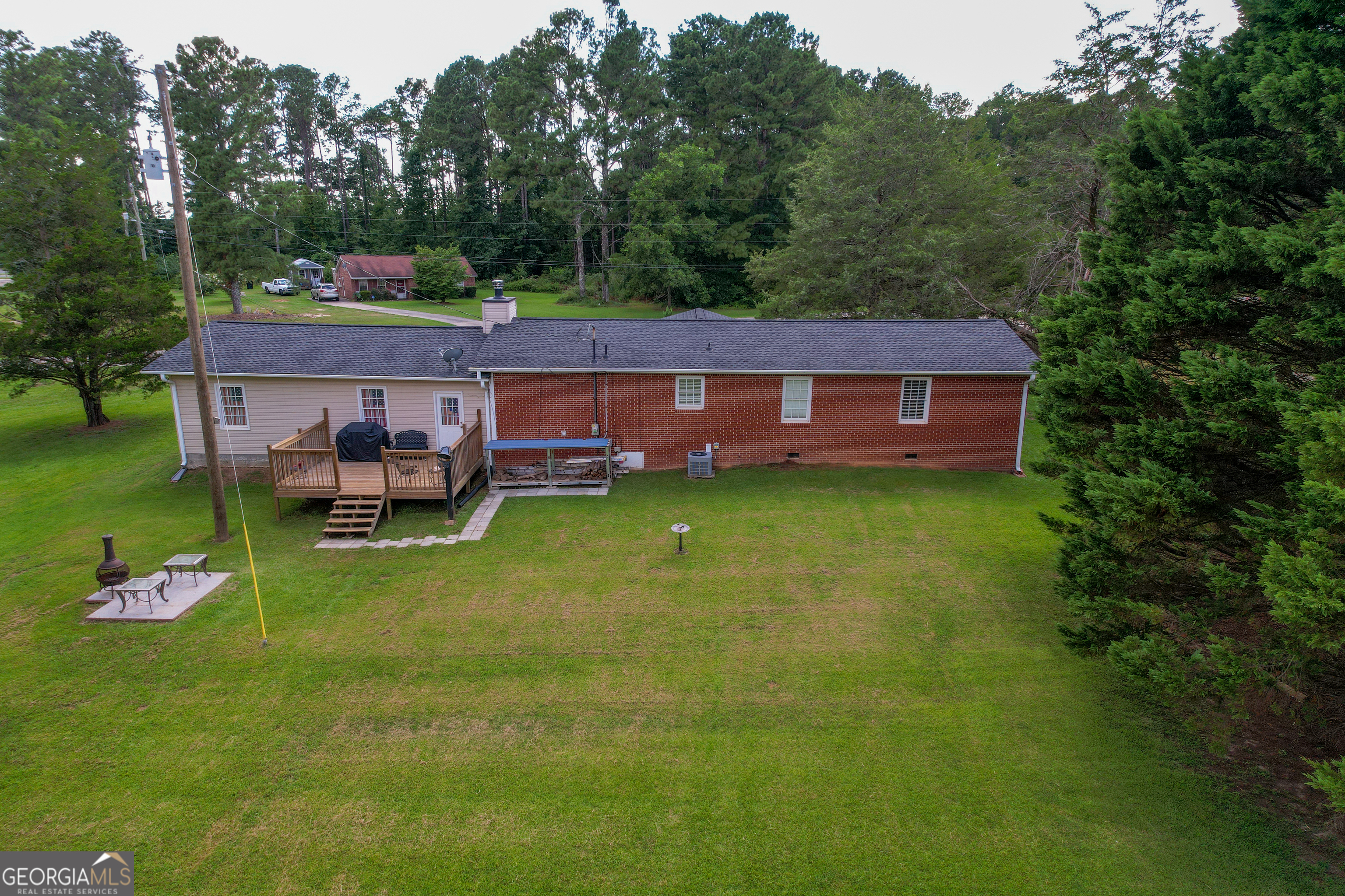 1537 Jackson Street Locust Grove, GA 30248 - Photo 7 of 41 a view of a house with a yard and sitting area