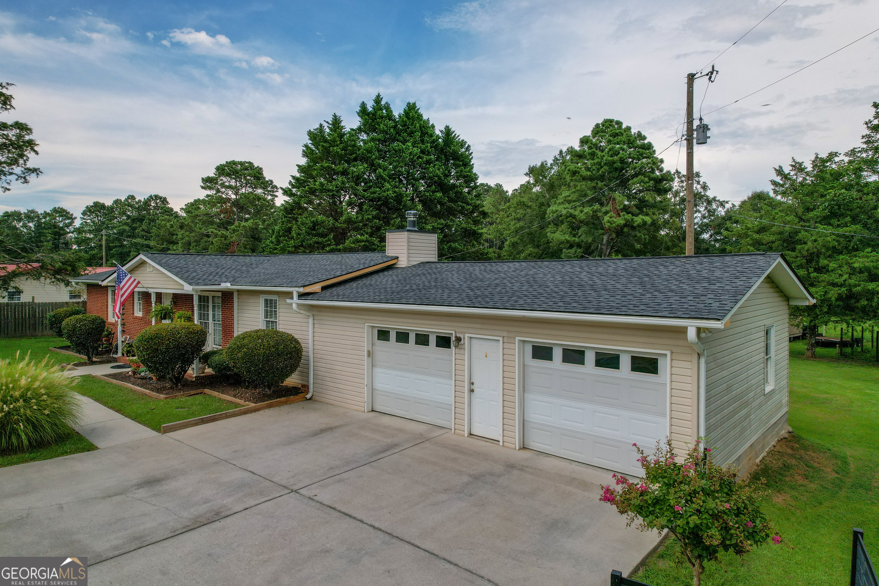 1537 Jackson Street Locust Grove, GA 30248 - Photo 8 of 41 a house view with a garden space