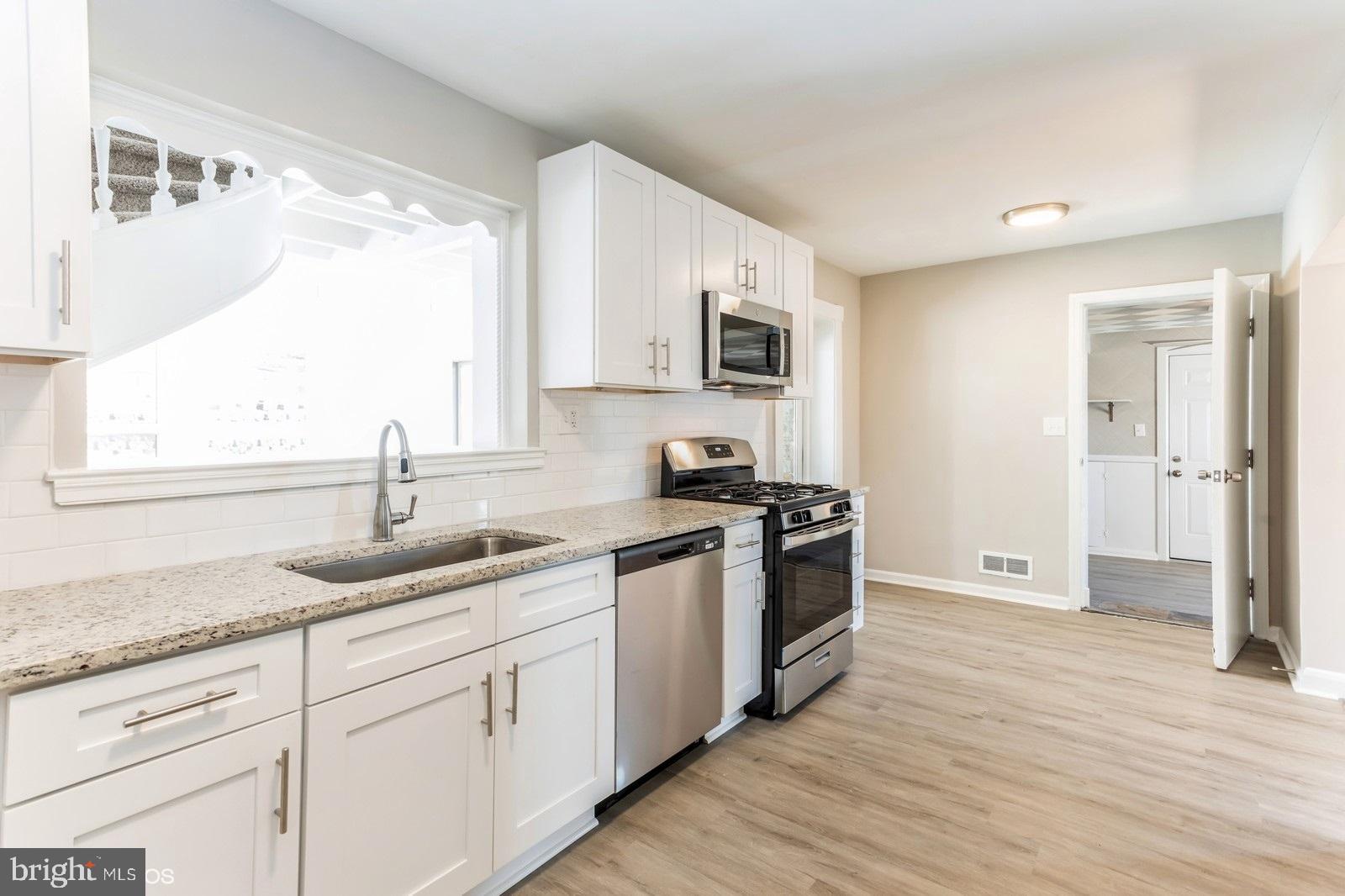 1014 Chesaco Avenue Rosedale, MD 21237 - Photo 8 of 26 Kitchen with Stainless Appliances
