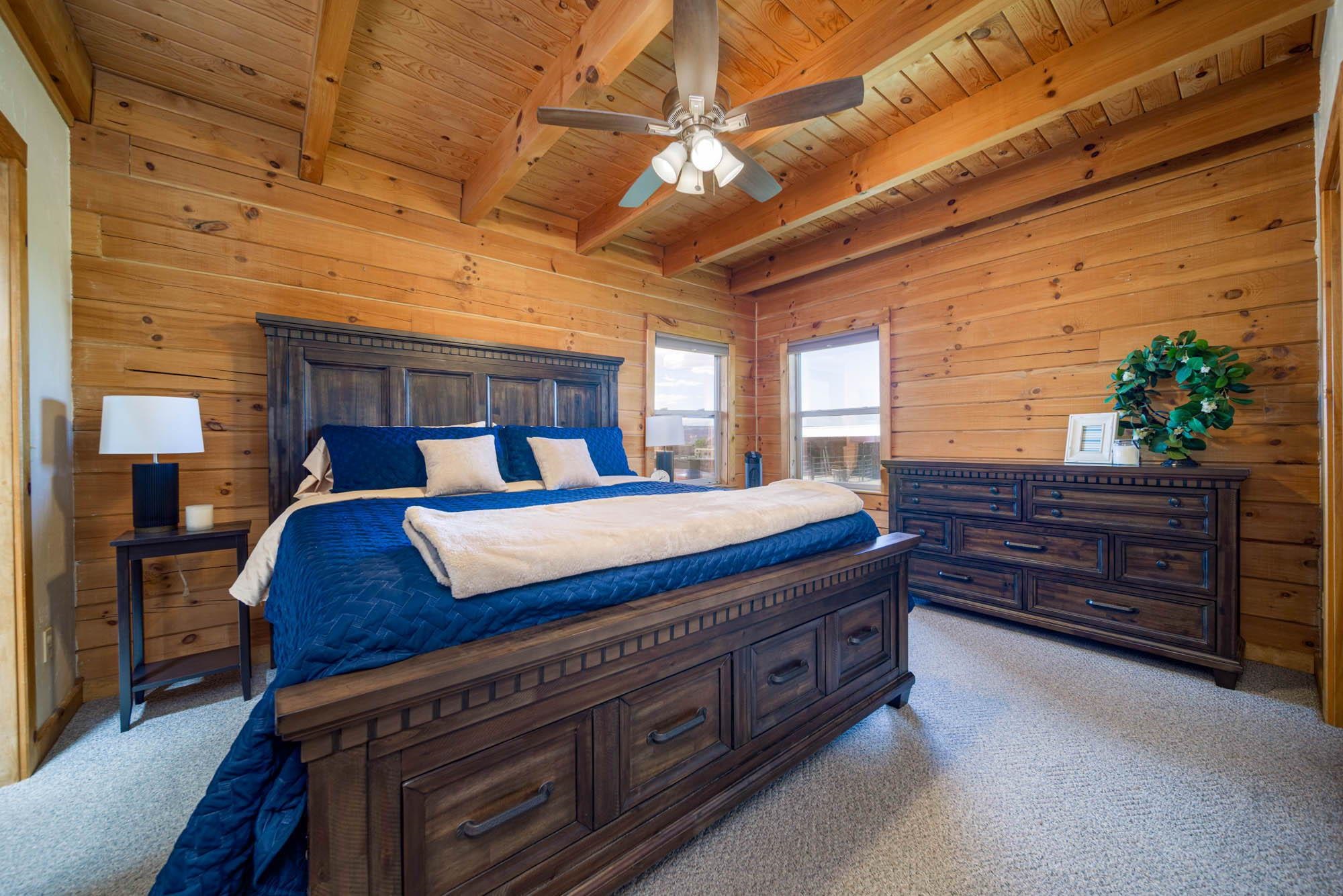 1213 Signal Rock Road Grand Junction, CO 81505 - Photo 20 of 20 a bed sitting in a spacious bedroom next to a window