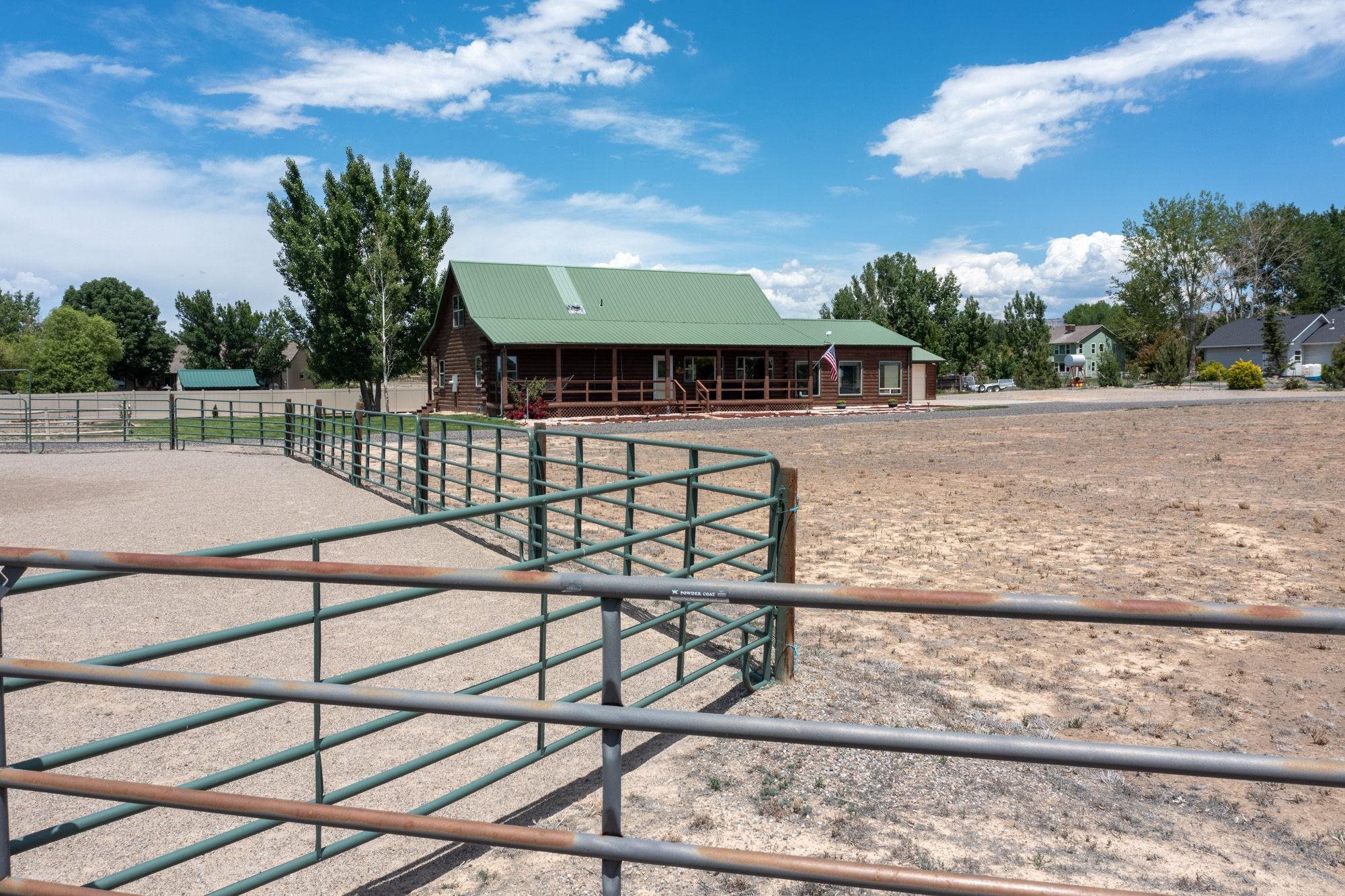 1213 Signal Rock Road Grand Junction, CO 81505 - Photo 5 of 20 a view of a backyard with a patio