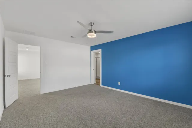 a bathroom with a double vanity sink and mirror