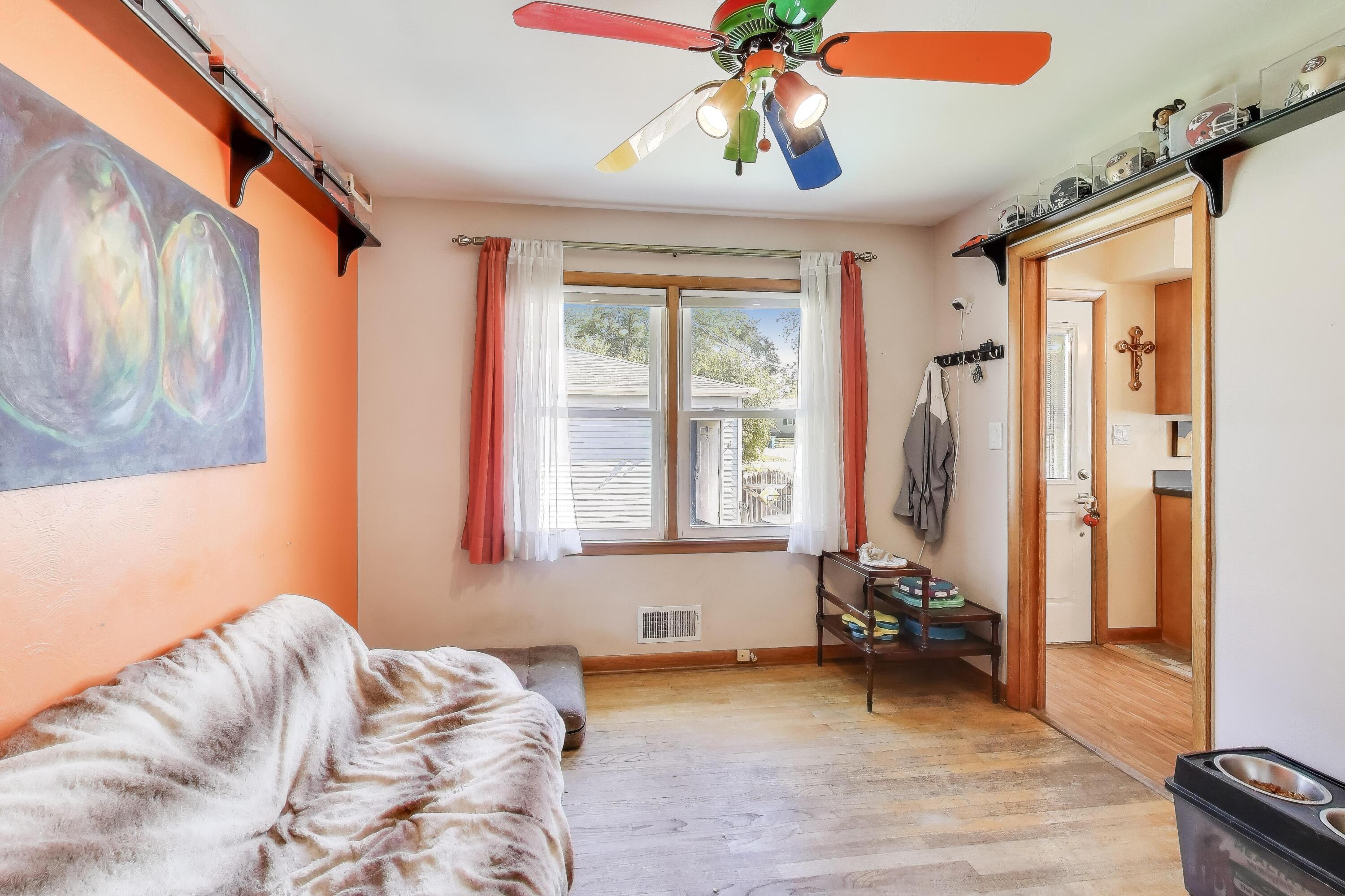 1343 Harvey Street Griffith, IN 46319 - Photo 11 of 31 a bedroom with furniture and a window