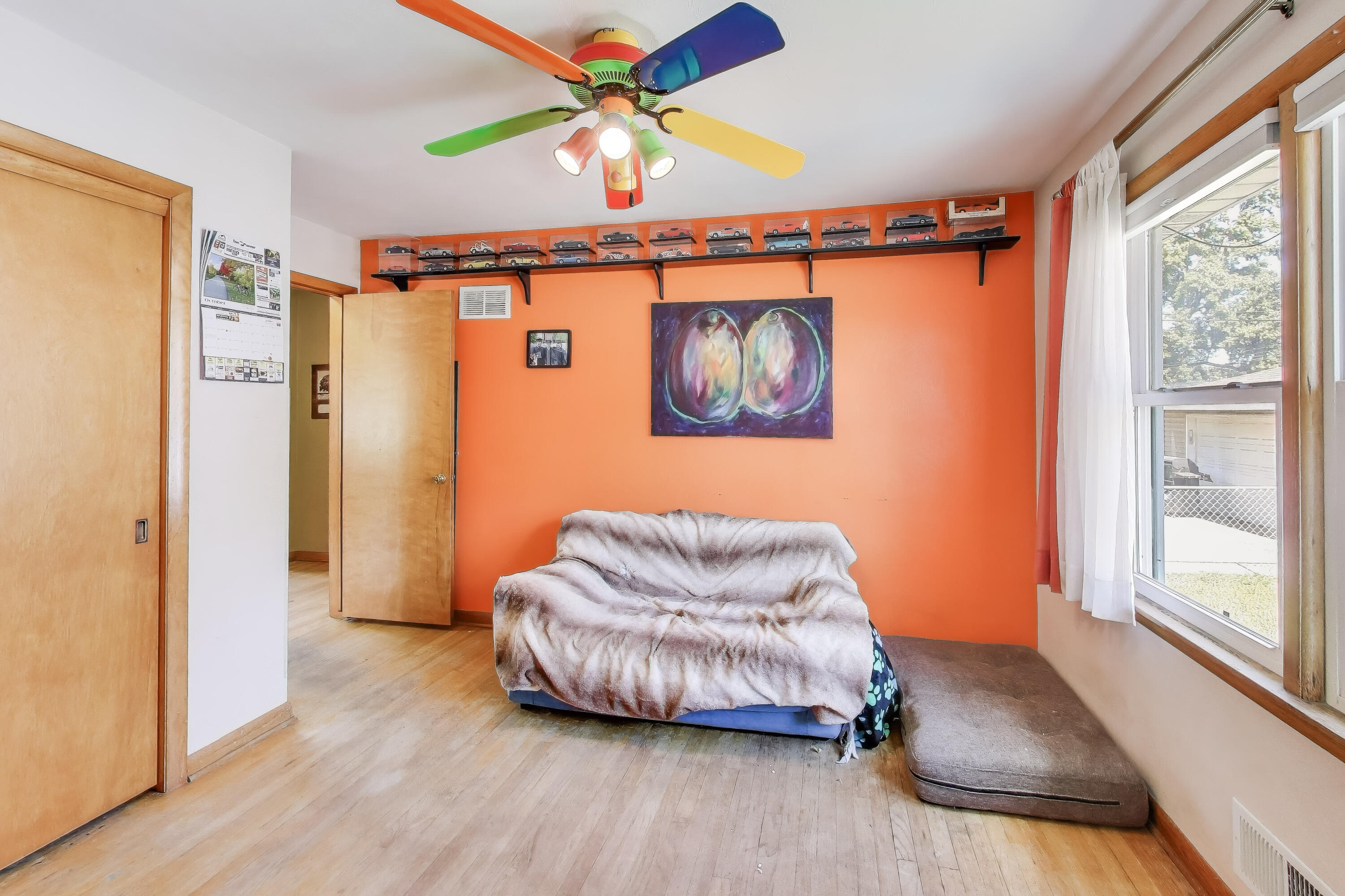 1343 Harvey Street Griffith, IN 46319 - Photo 13 of 31 a living room with furniture and a window