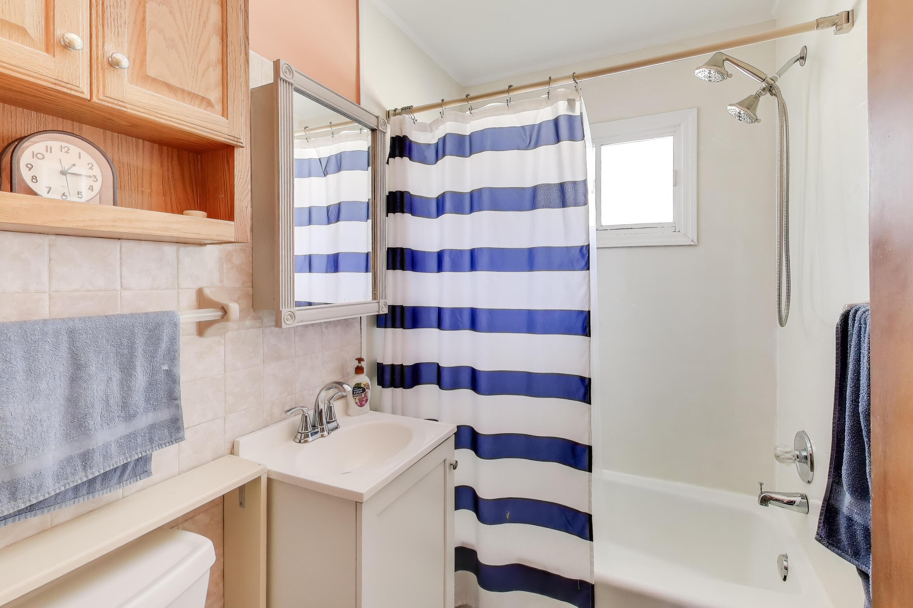 1343 Harvey Street Griffith, IN 46319 - Photo 20 of 31 a bathroom with a sink a toilet and shower