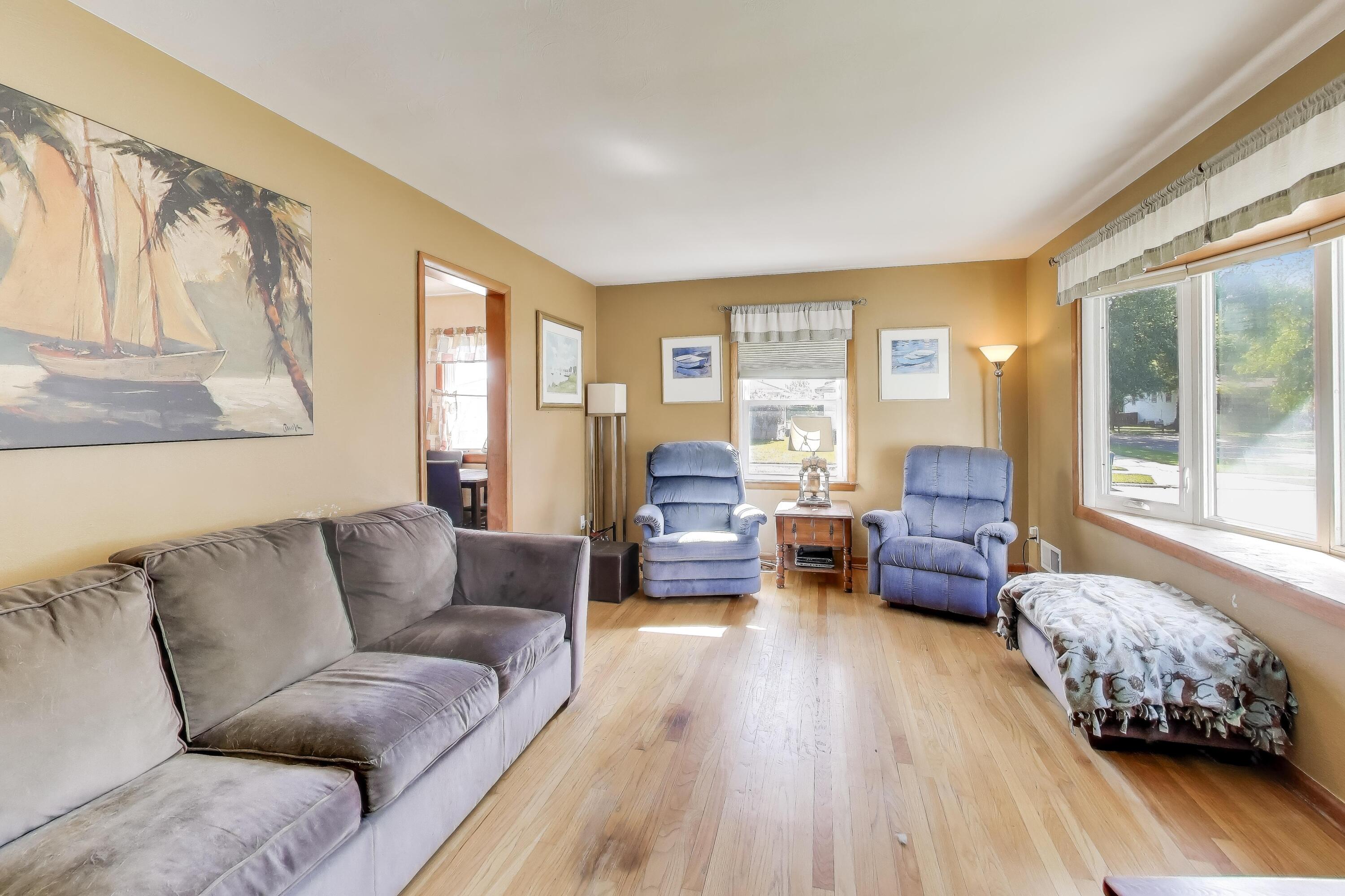 1343 Harvey Street Griffith, IN 46319 - Photo 2 of 31 a living room with furniture and a large window