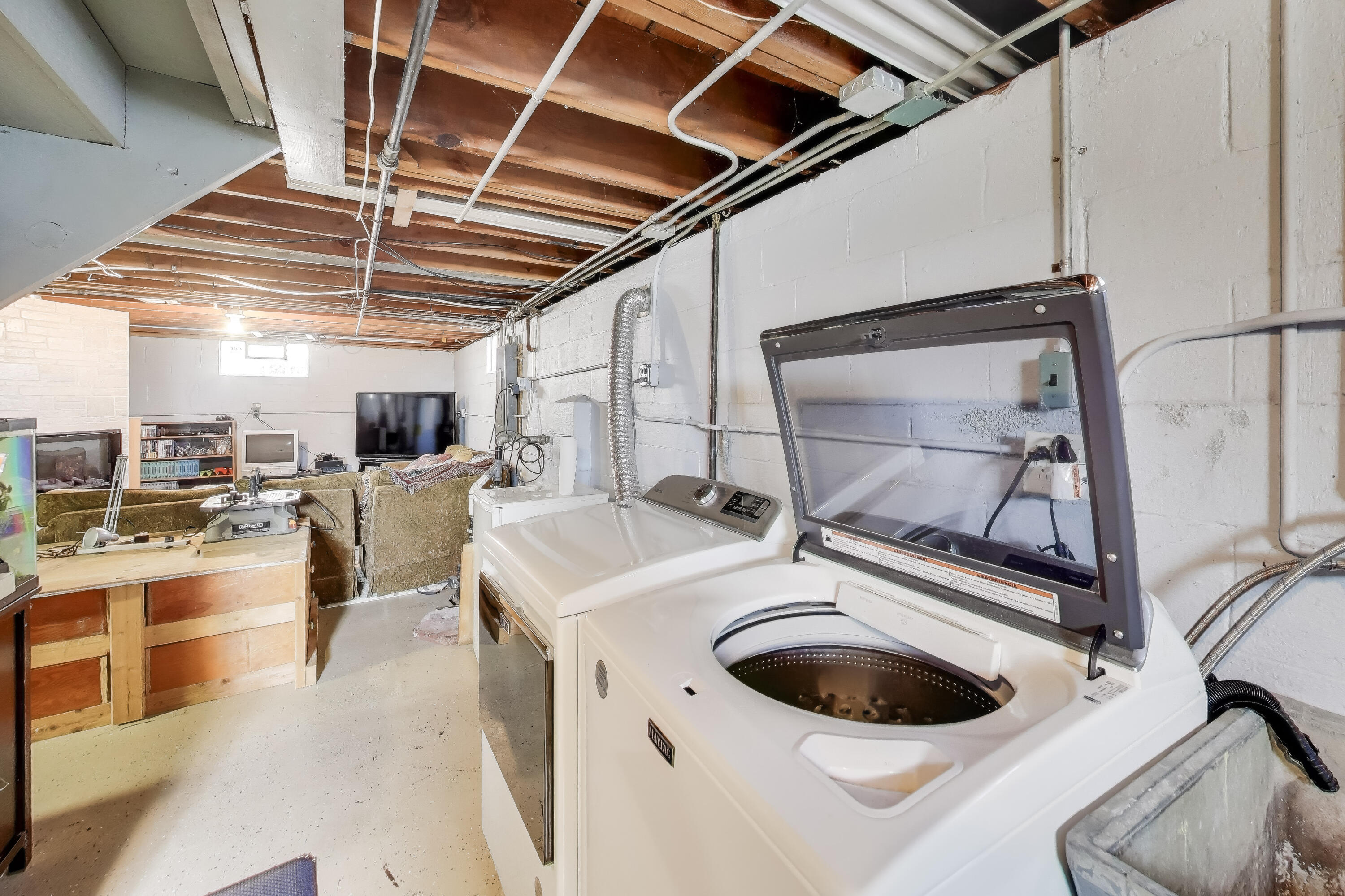 1343 Harvey Street Griffith, IN 46319 - Photo 22 of 31 a room with storage and utility