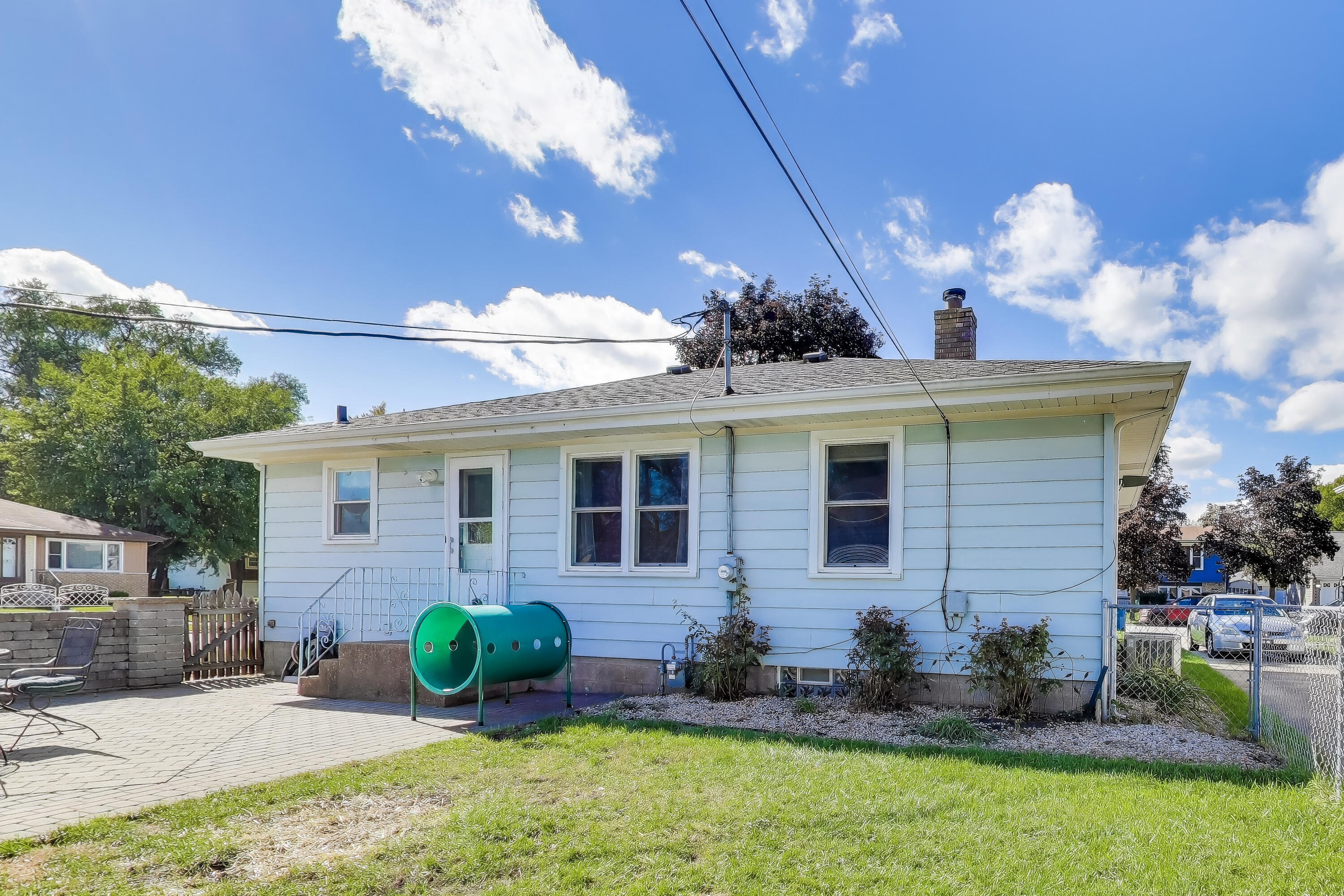 1343 Harvey Street Griffith, IN 46319 - Photo 24 of 31 a front view of a house with garden