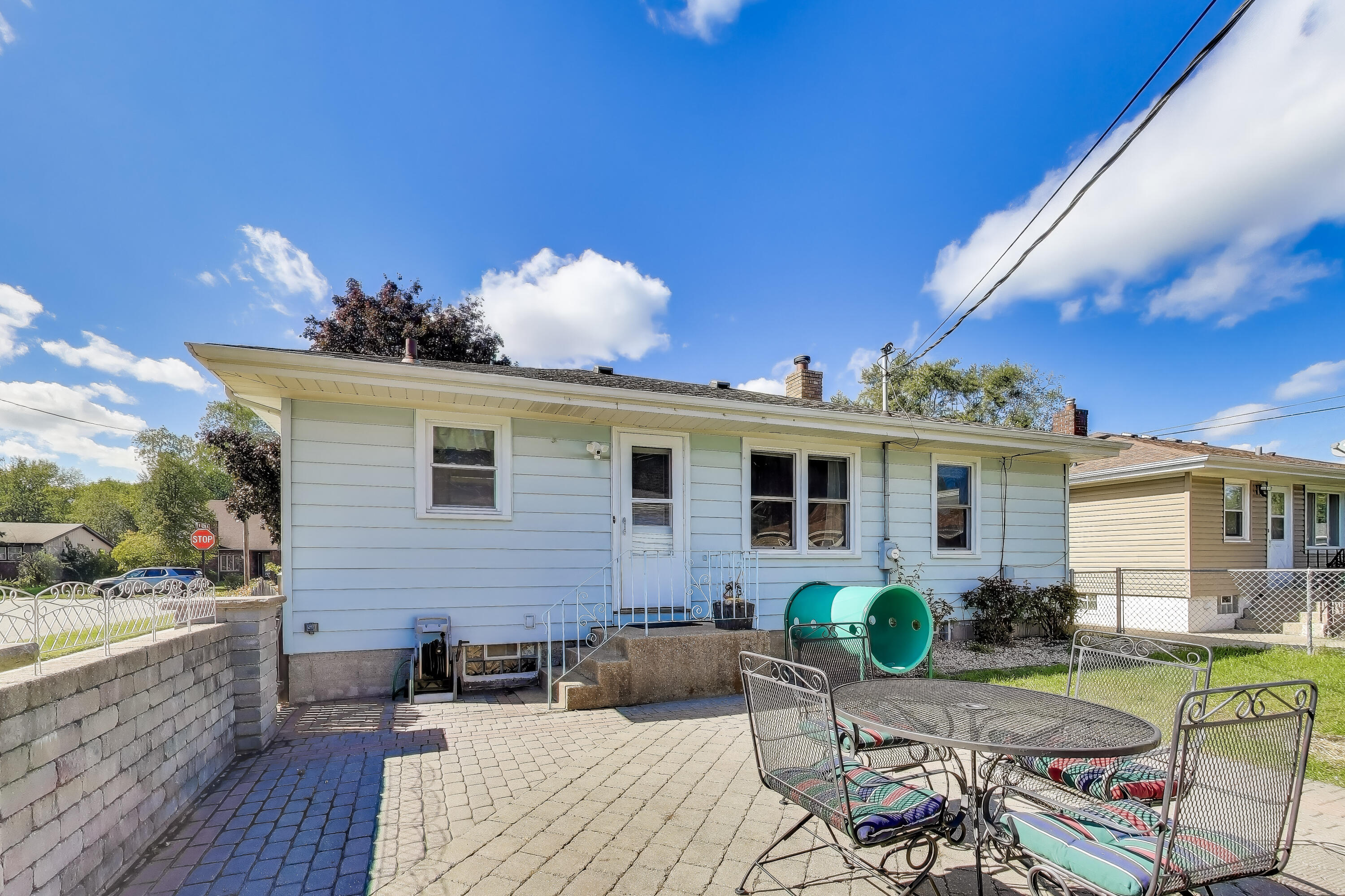 1343 Harvey Street Griffith, IN 46319 - Photo 25 of 31 a front view of house with yard seating and green space
