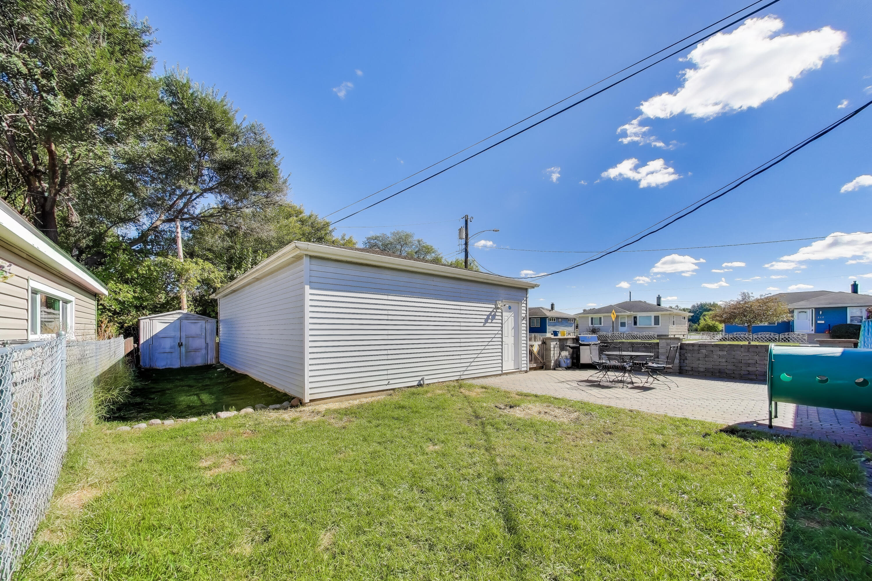 1343 Harvey Street Griffith, IN 46319 - Photo 29 of 31 a swimming pool with outdoor seating and yard