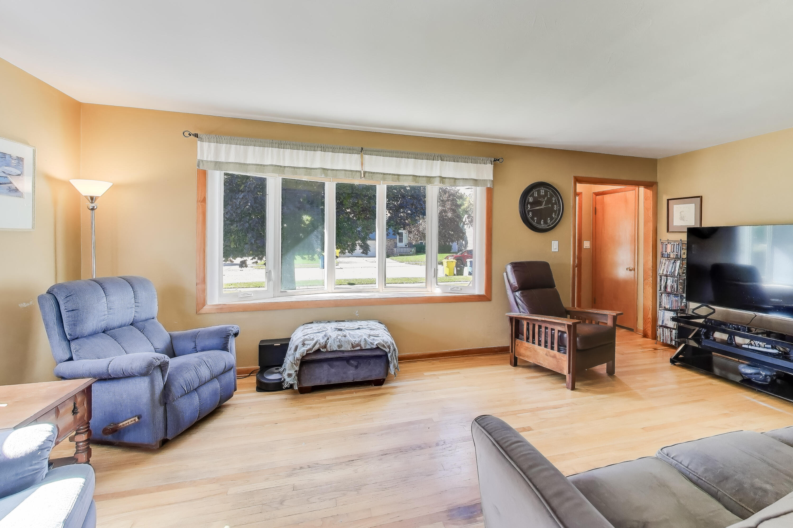 1343 Harvey Street Griffith, IN 46319 - Photo 3 of 31 a living room with furniture and a flat screen tv