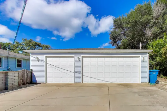 a view of a house with a garage