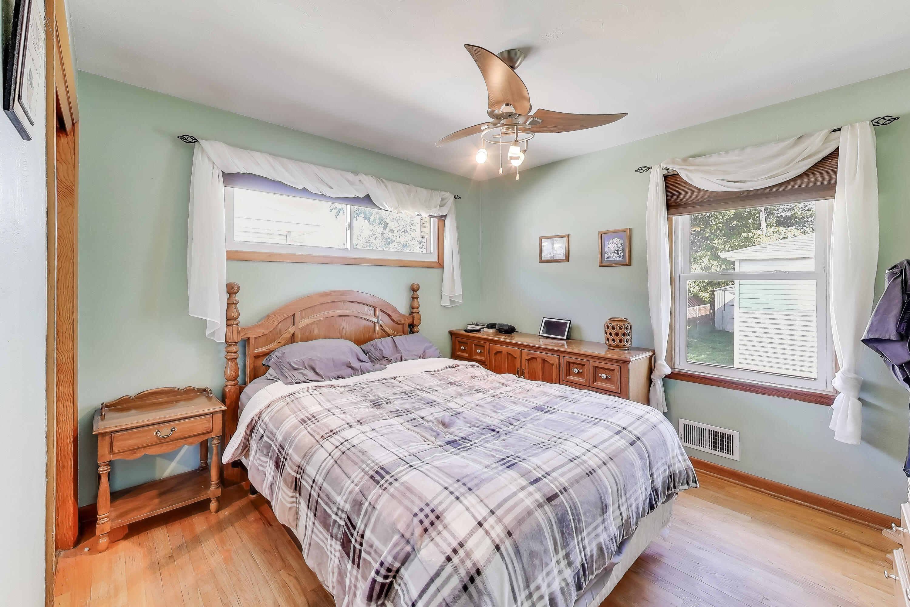 1343 Harvey Street Griffith, IN 46319 - Photo 9 of 31 a bedroom with a bed and a window
