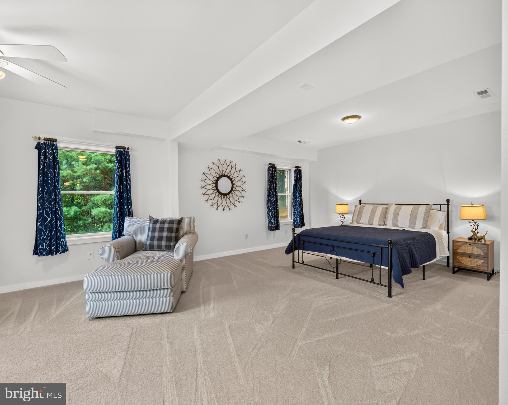 4028 South F T Valley Road Etlan, VA 22719 - Photo 72 of 101 a bedroom with a bed and a couch