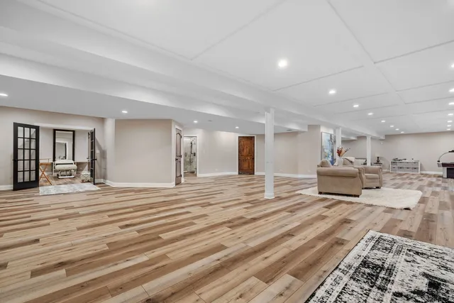 a living room with furniture and a table