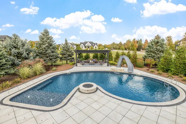 a view of swimming pool from a balcony