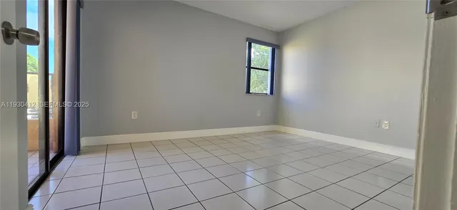 a view of an empty room with window