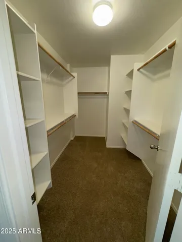 a view of a refrigerator in a kitchen