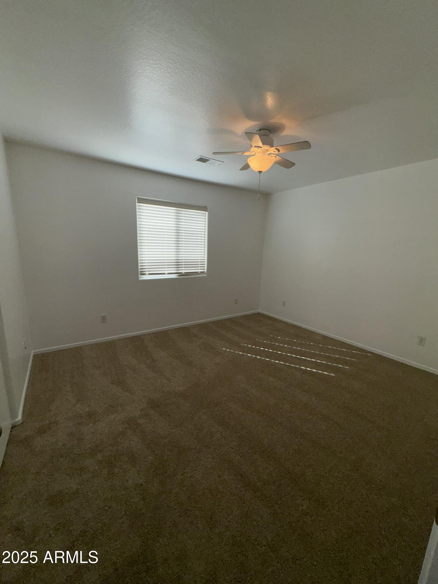 1976 West Rd Agent Street Apache Junction, AZ 85120 - Photo 9 of 15 an empty room with a window