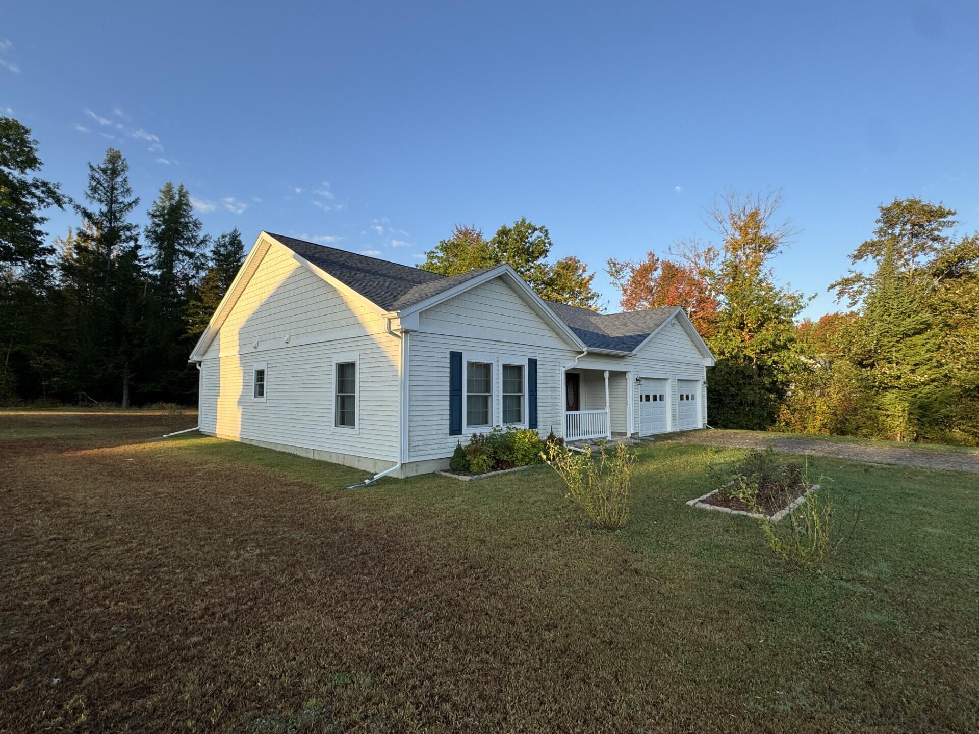 5 Chestnut Street Unity, ME 04988 - Photo 2 of 24 Left side