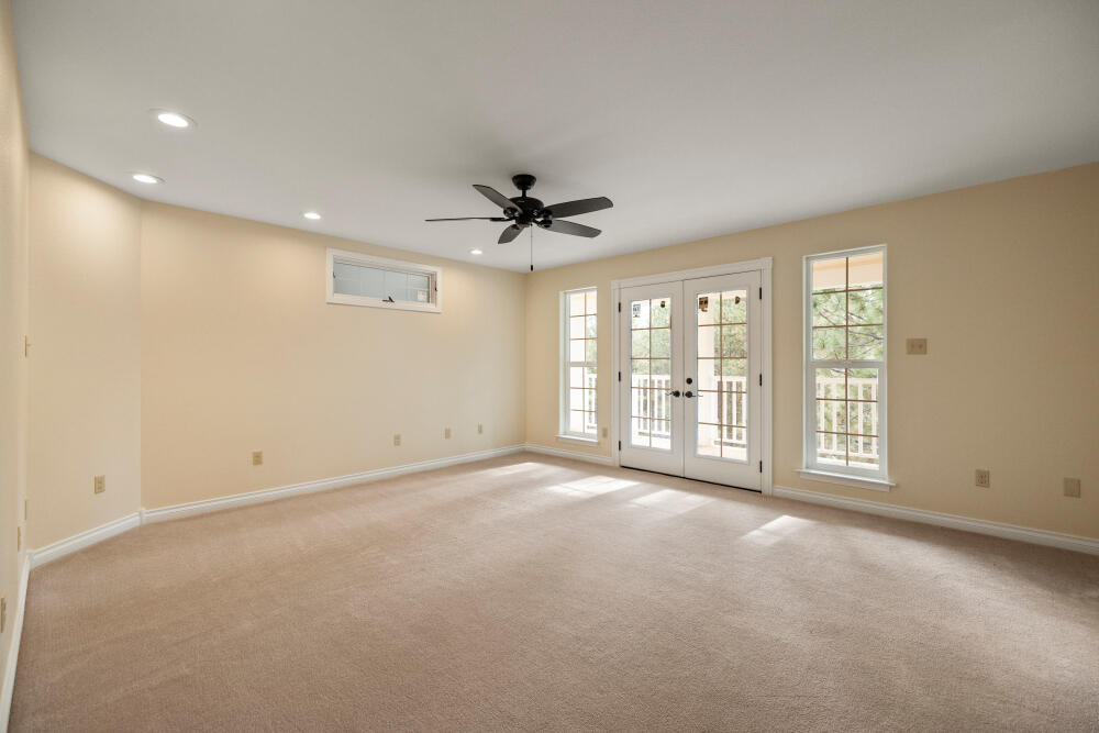 13423 Sprague River Road, Unit 1 Chiloquin, OR 97624 - Photo 21 of 46 Master bedroom with french doors to deck