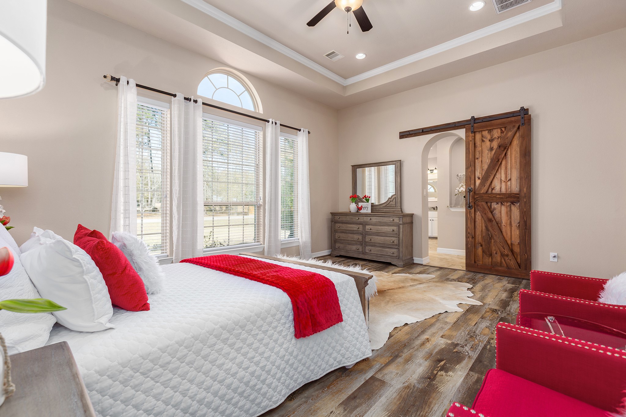 27688 Rio Blanco Drive Splendora, TX 77372 - Photo 23 of 50 a bedroom with a bed and a large window