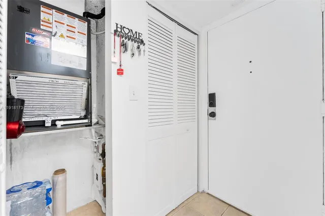 a view of a hallway with windows