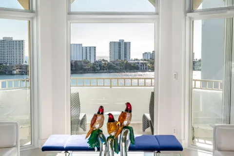 a city view from a balcony with city view