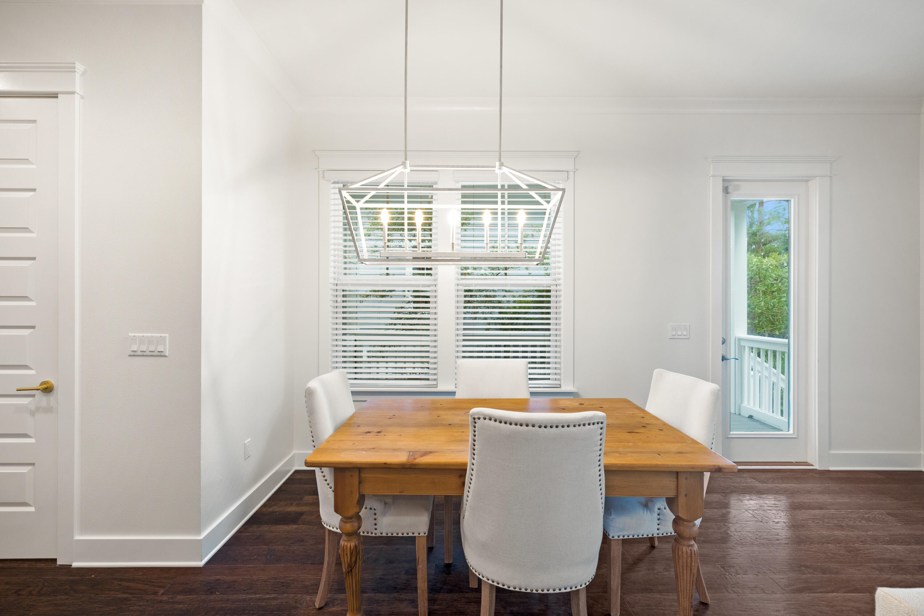 267 Emerald Beach Circle Santa Rosa Beach, FL 32459 - Photo 19 of 59 a view of a dining room with furniture window and wooden floor