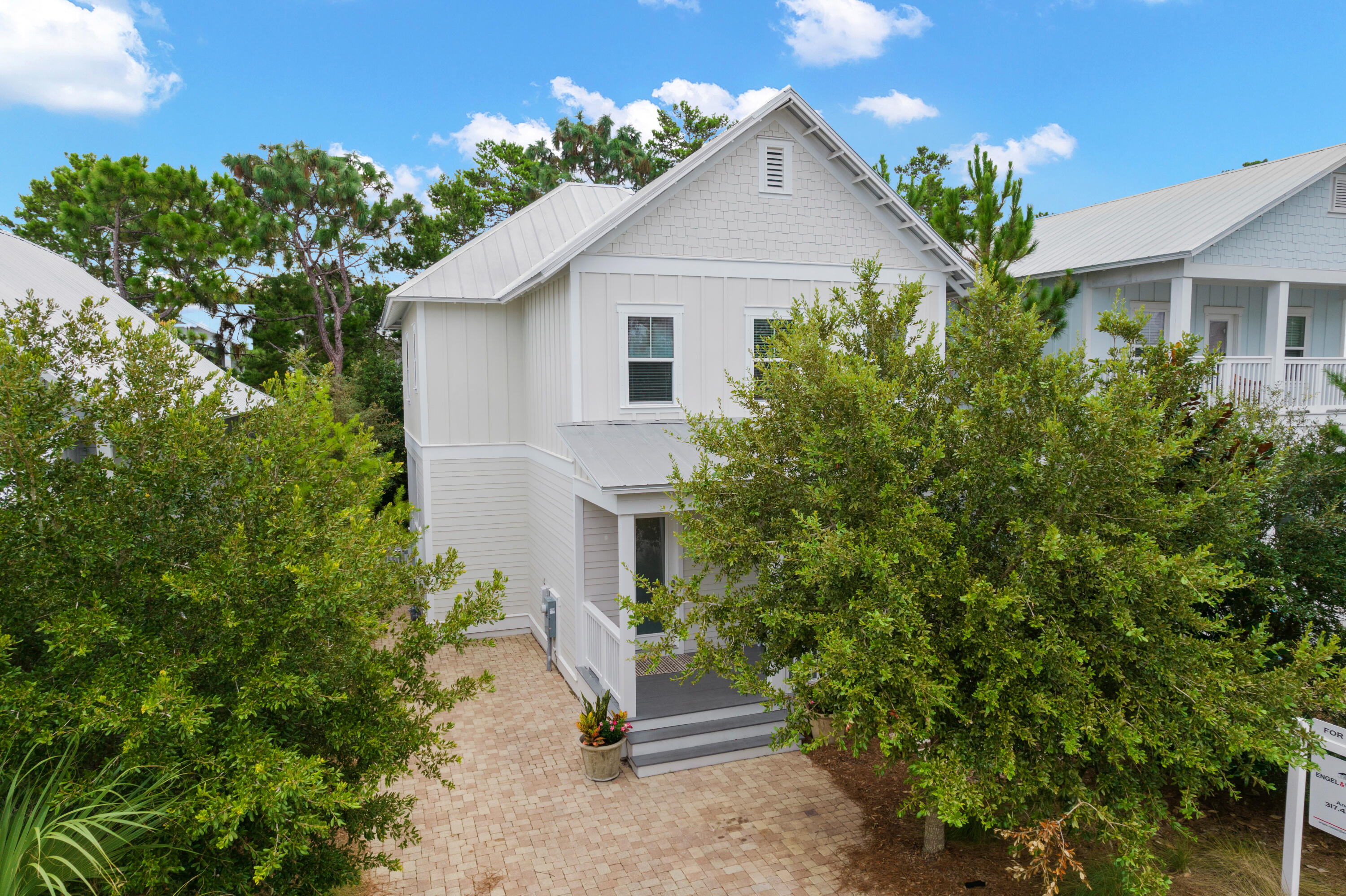 267 Emerald Beach Circle Santa Rosa Beach, FL 32459 - Photo 2 of 59 a view of a house with a yard and plants