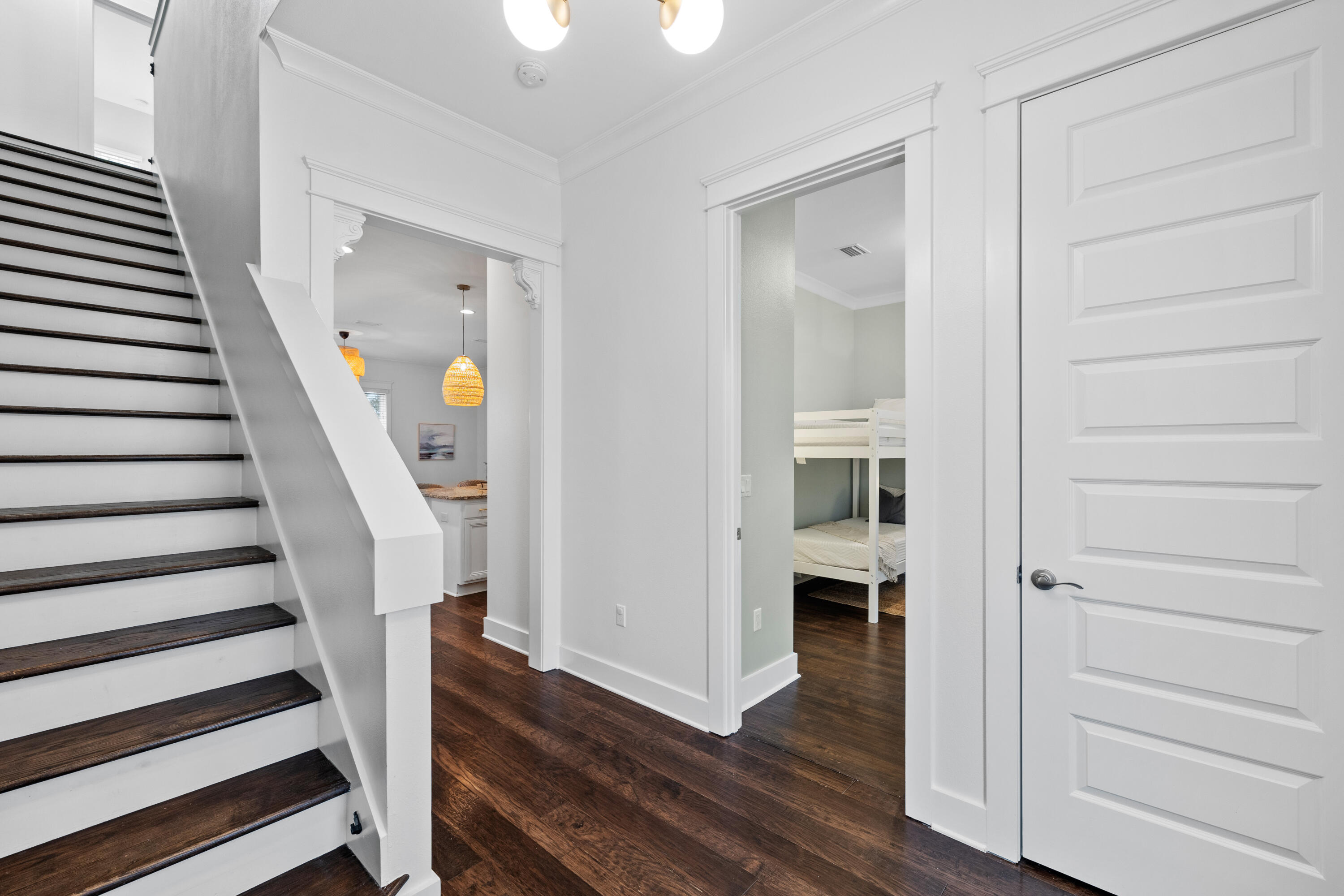 267 Emerald Beach Circle Santa Rosa Beach, FL 32459 - Photo 21 of 59 a view of a hallway with wooden floor and entryway