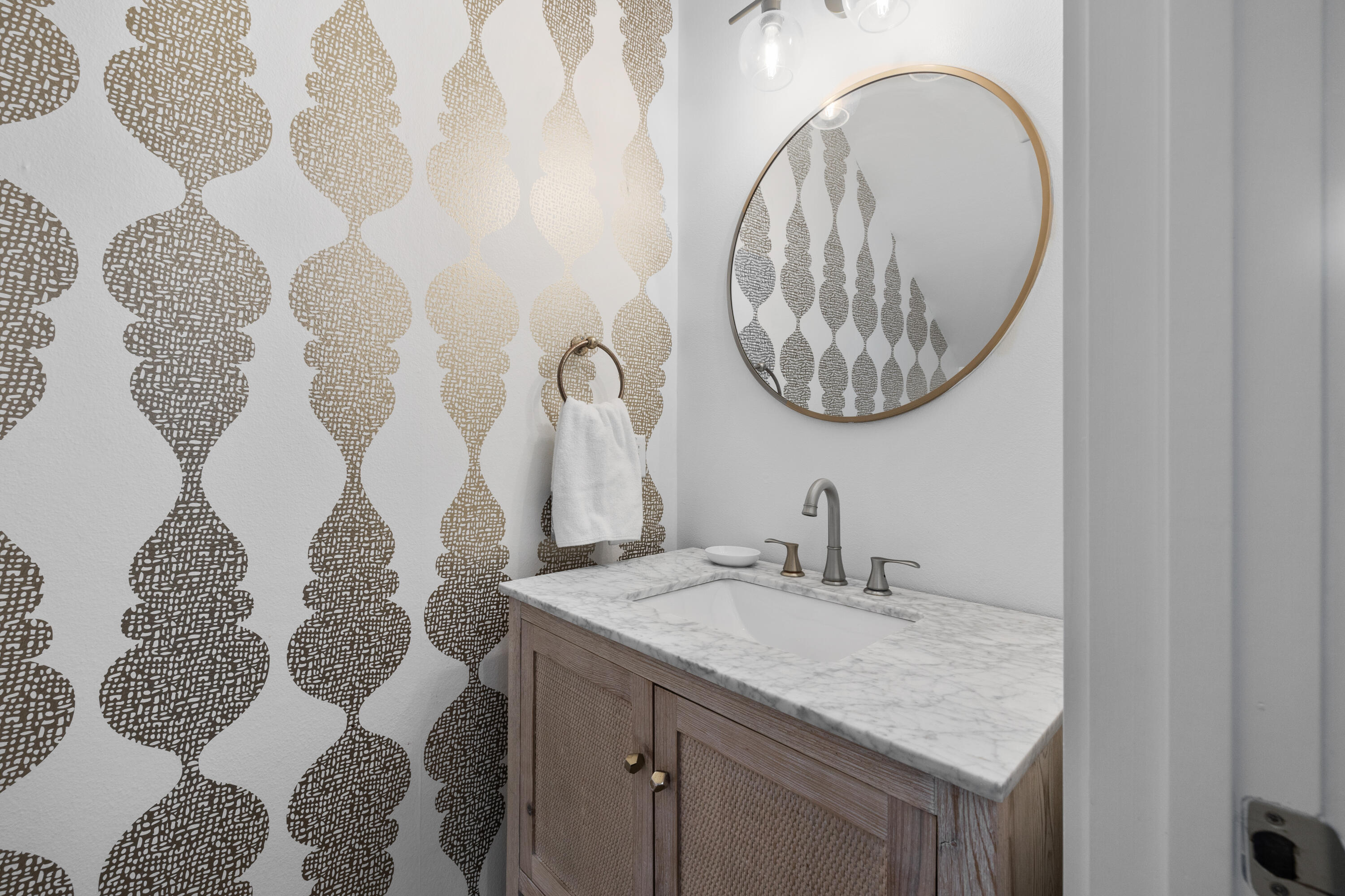 267 Emerald Beach Circle Santa Rosa Beach, FL 32459 - Photo 26 of 59 a bathroom with a sink and a mirror