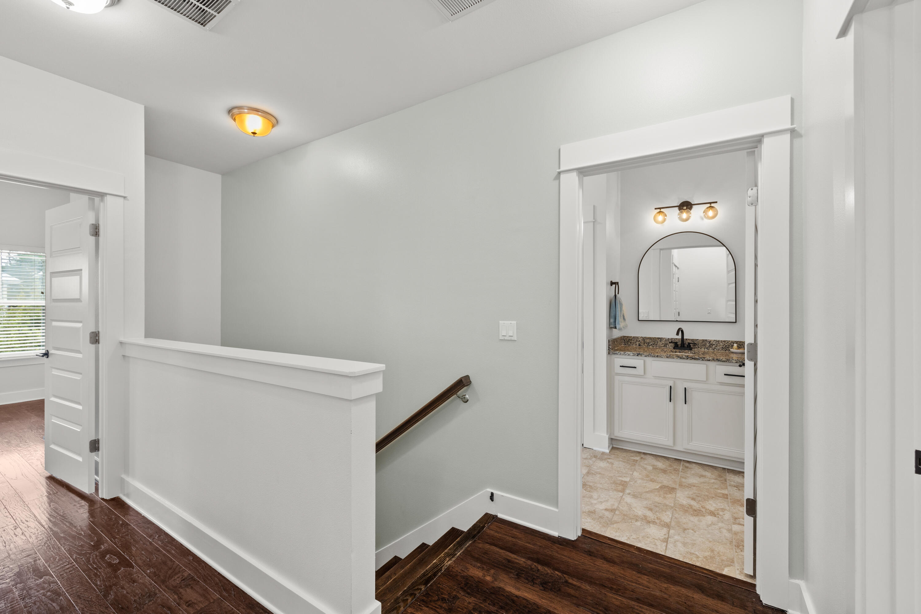 267 Emerald Beach Circle Santa Rosa Beach, FL 32459 - Photo 28 of 59 a view of an entryway with wooden floor