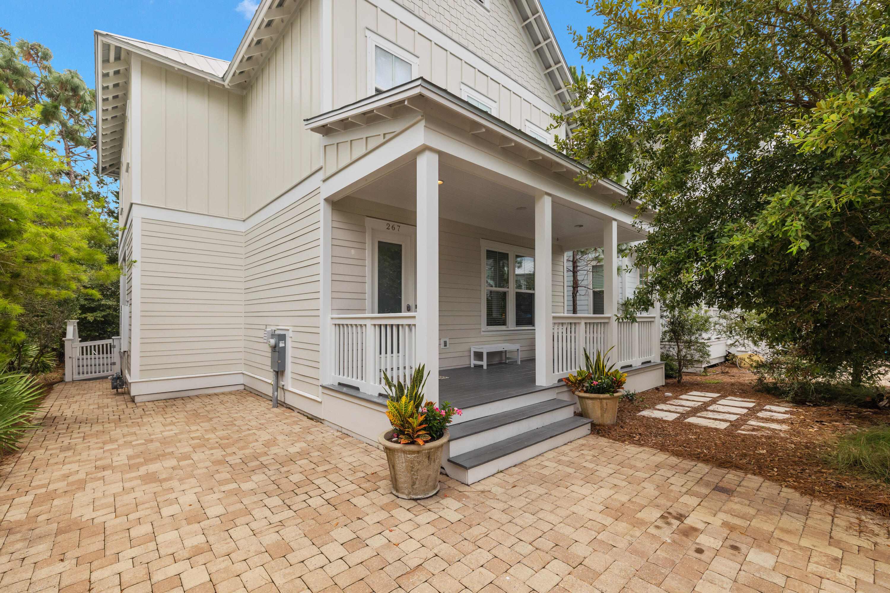 267 Emerald Beach Circle Santa Rosa Beach, FL 32459 - Photo 3 of 59 a view of a house with backyard and sitting area
