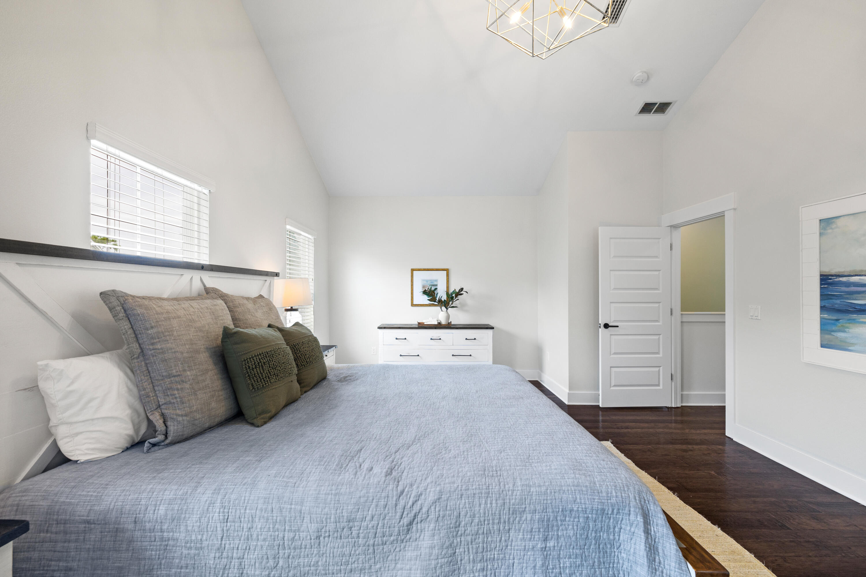 267 Emerald Beach Circle Santa Rosa Beach, FL 32459 - Photo 33 of 59 a bedroom with a large bed and dresser