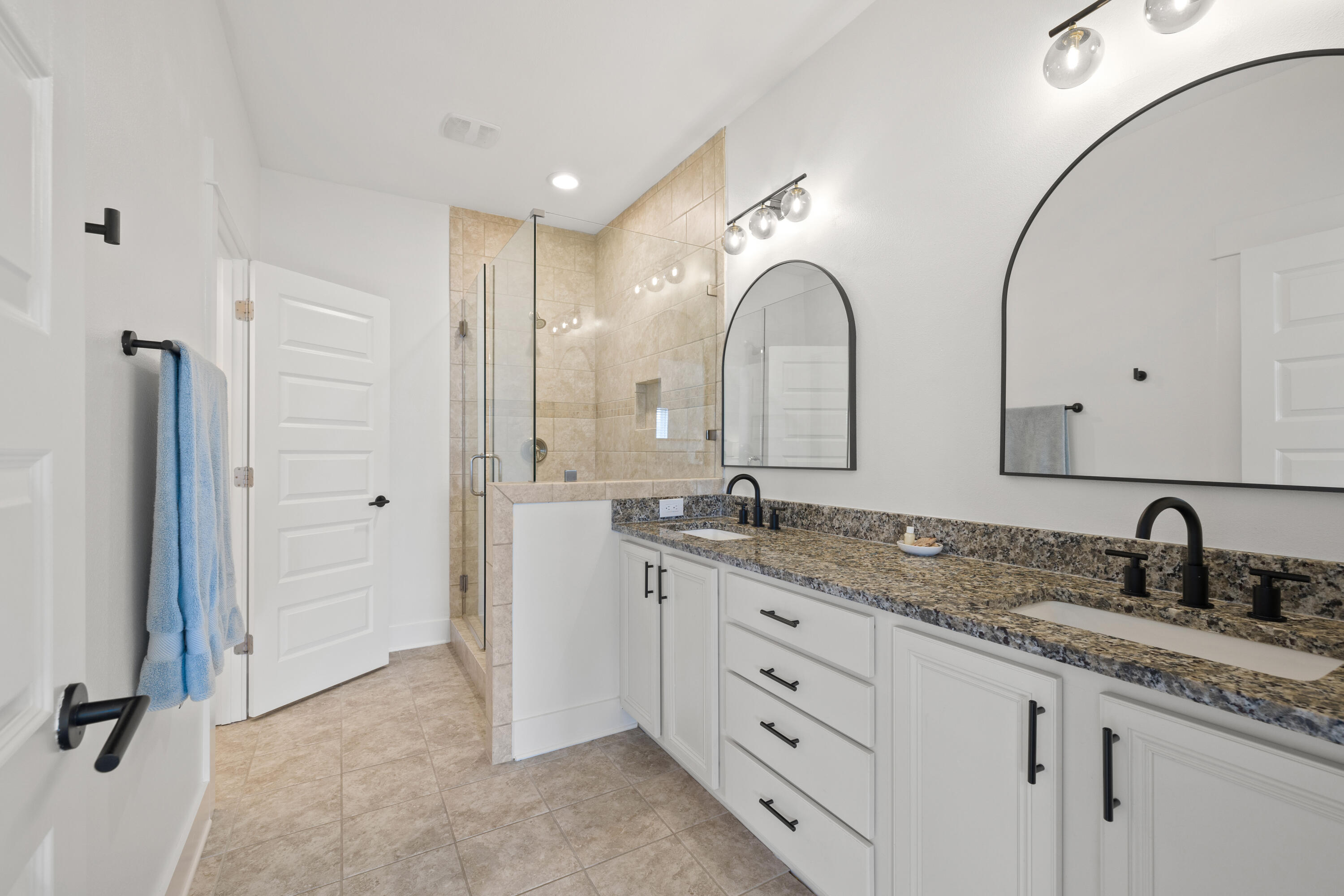 267 Emerald Beach Circle Santa Rosa Beach, FL 32459 - Photo 34 of 59 a bathroom with double sink and a mirror