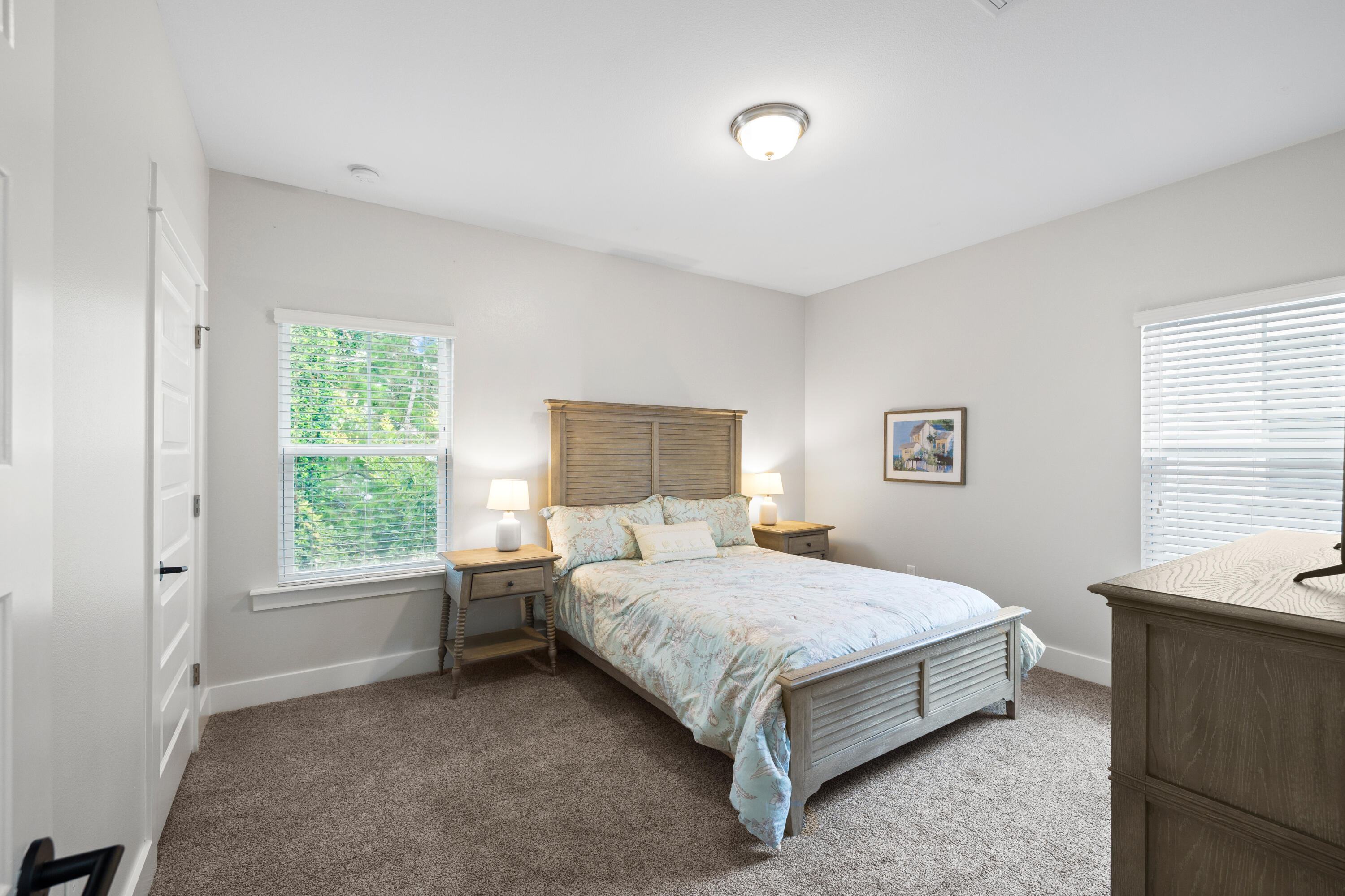 267 Emerald Beach Circle Santa Rosa Beach, FL 32459 - Photo 40 of 59 a bedroom with a bed and a window