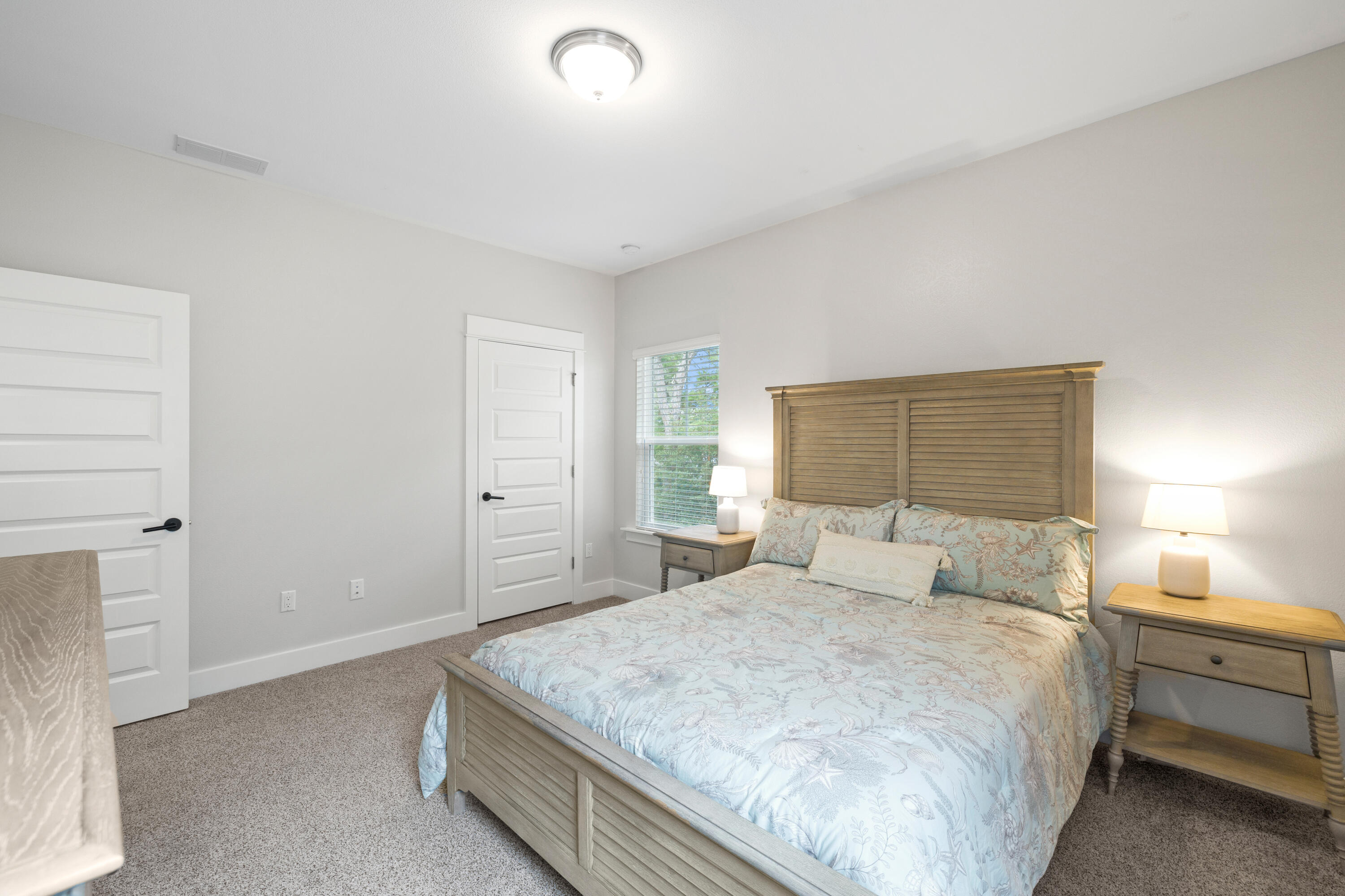 267 Emerald Beach Circle Santa Rosa Beach, FL 32459 - Photo 42 of 59 a bedroom with a bed and a window