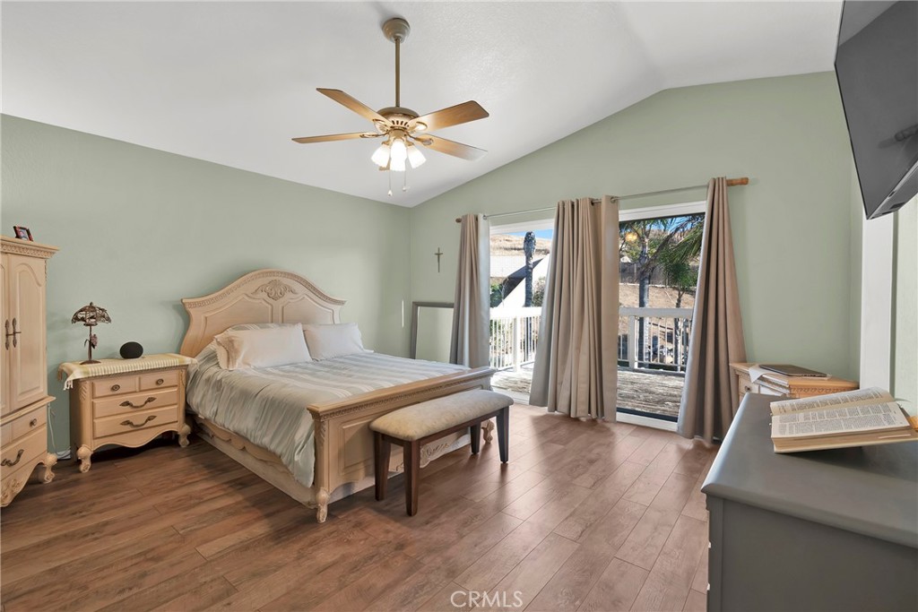 3350 May Court Riverside, CA 92503 - Photo 20 of 55 a bedroom with a bed and a chandelier